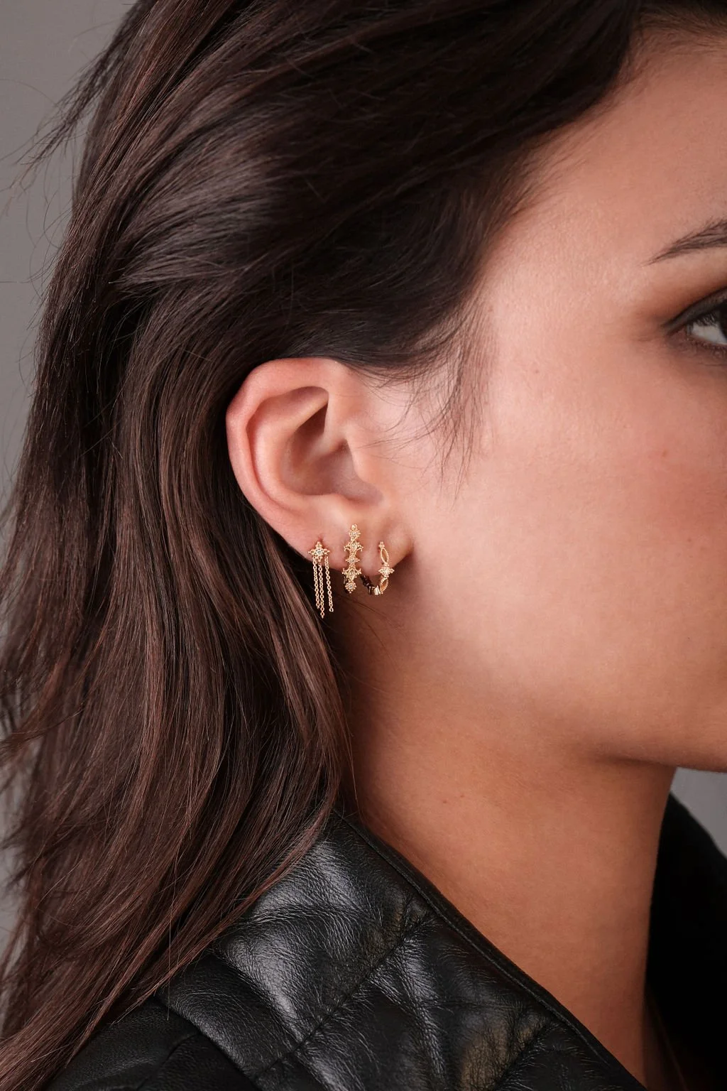 Angele Brousse gold earring stack on model