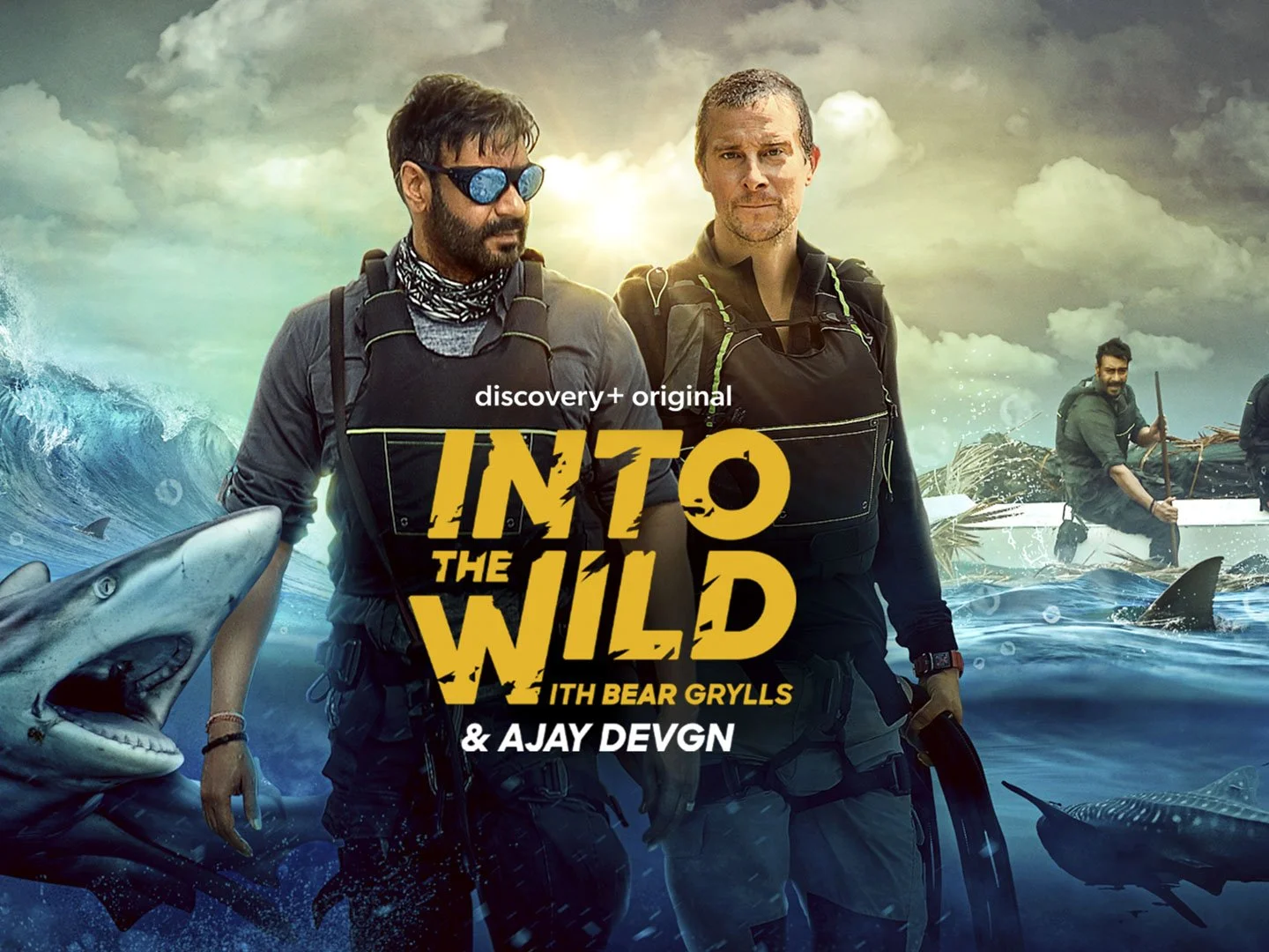 Two men in outdoor gear stand in the ocean with sharks and other sea creatures around them, with a stormy sky and a sunset in the background, promoting the show 'Into the Wild'.