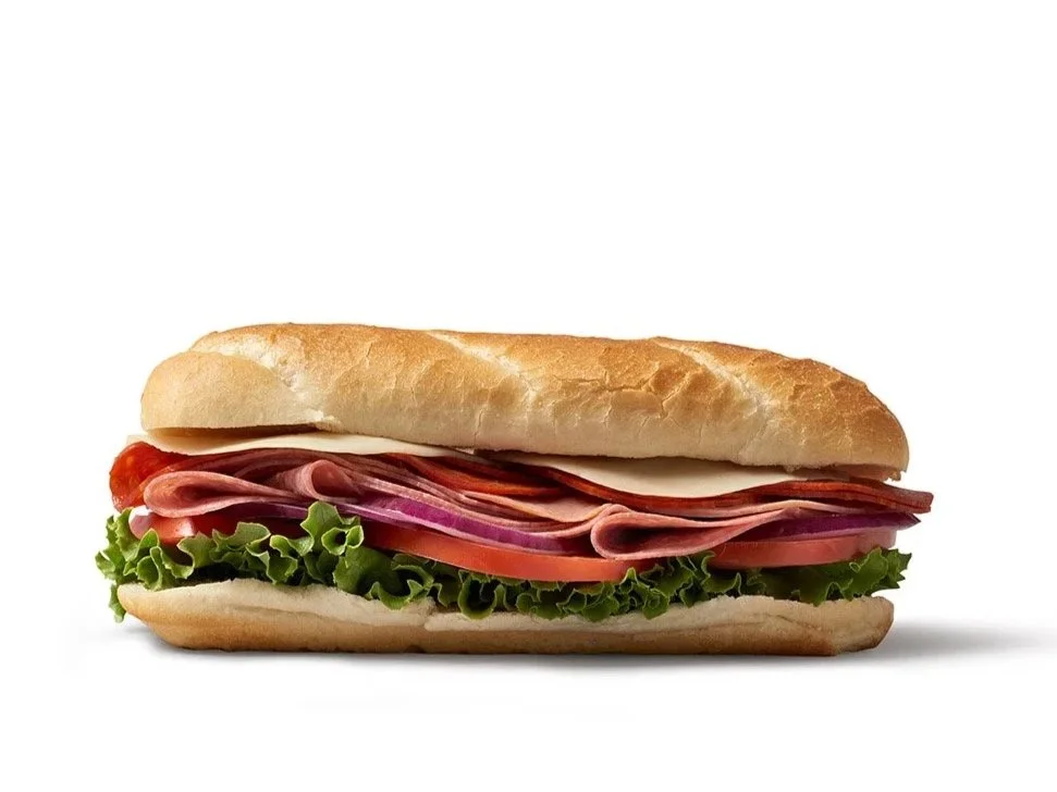artful deli sandwich on white background