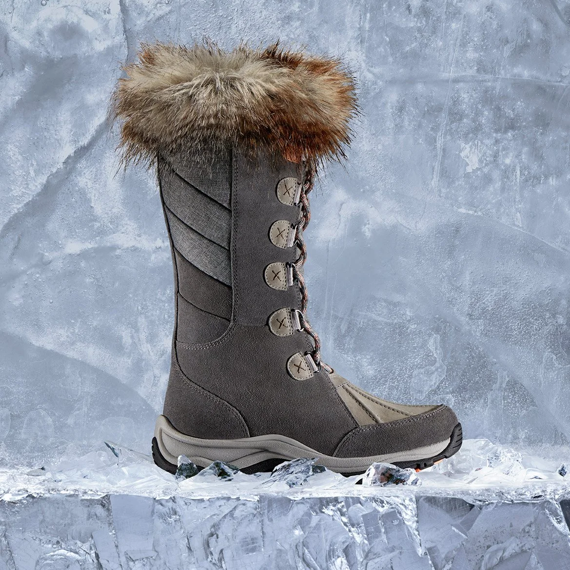 women's tall lace up boot with fur cuff set on ice background