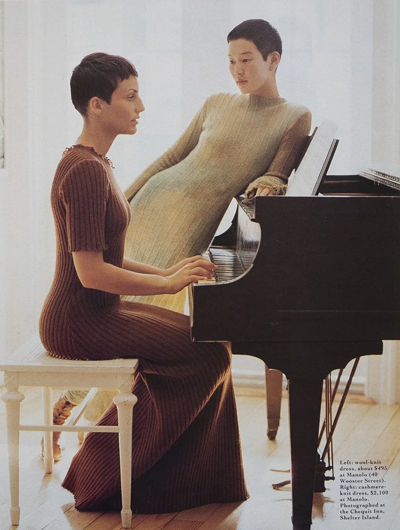A woman playing the piano with a woman in a reflective pose in an art piece style