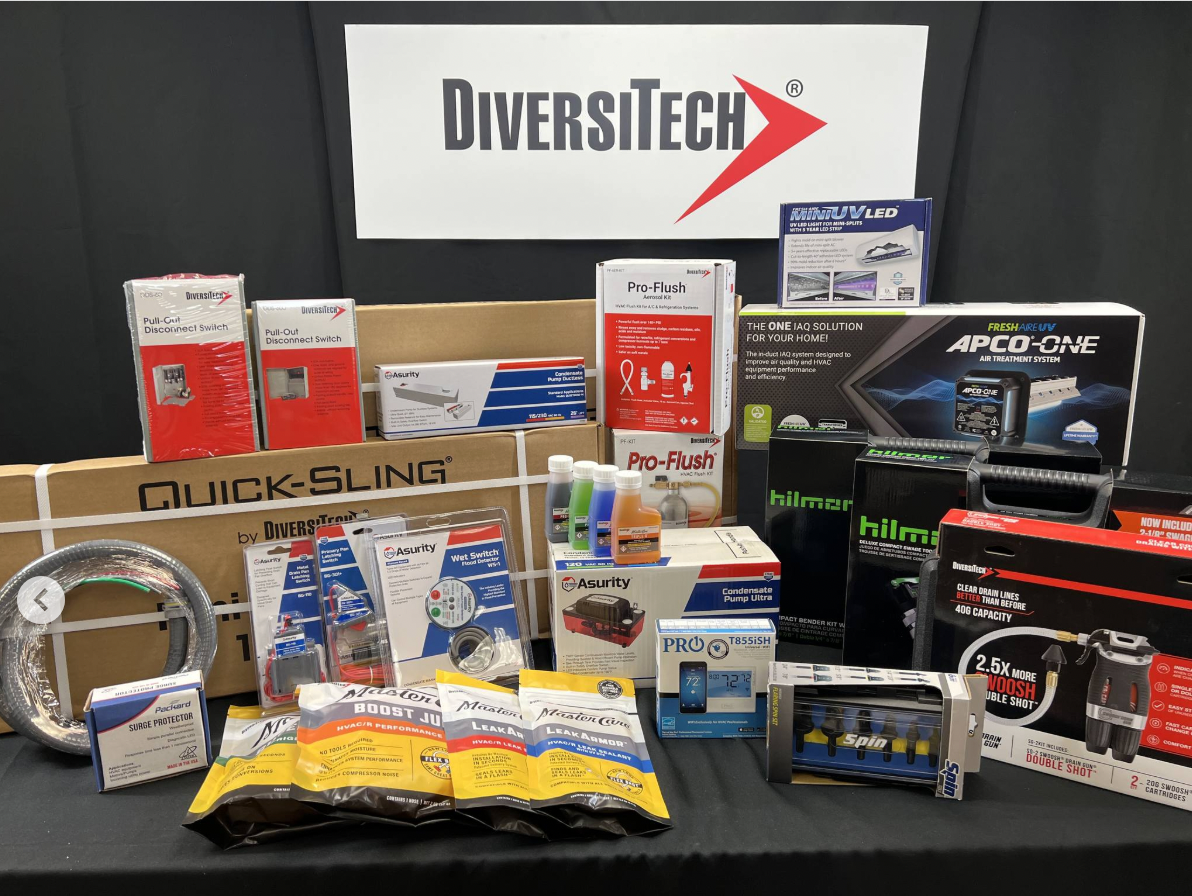 Display of various electrical and plumbing parts and tools, including switches, hoses, and a leak detector.