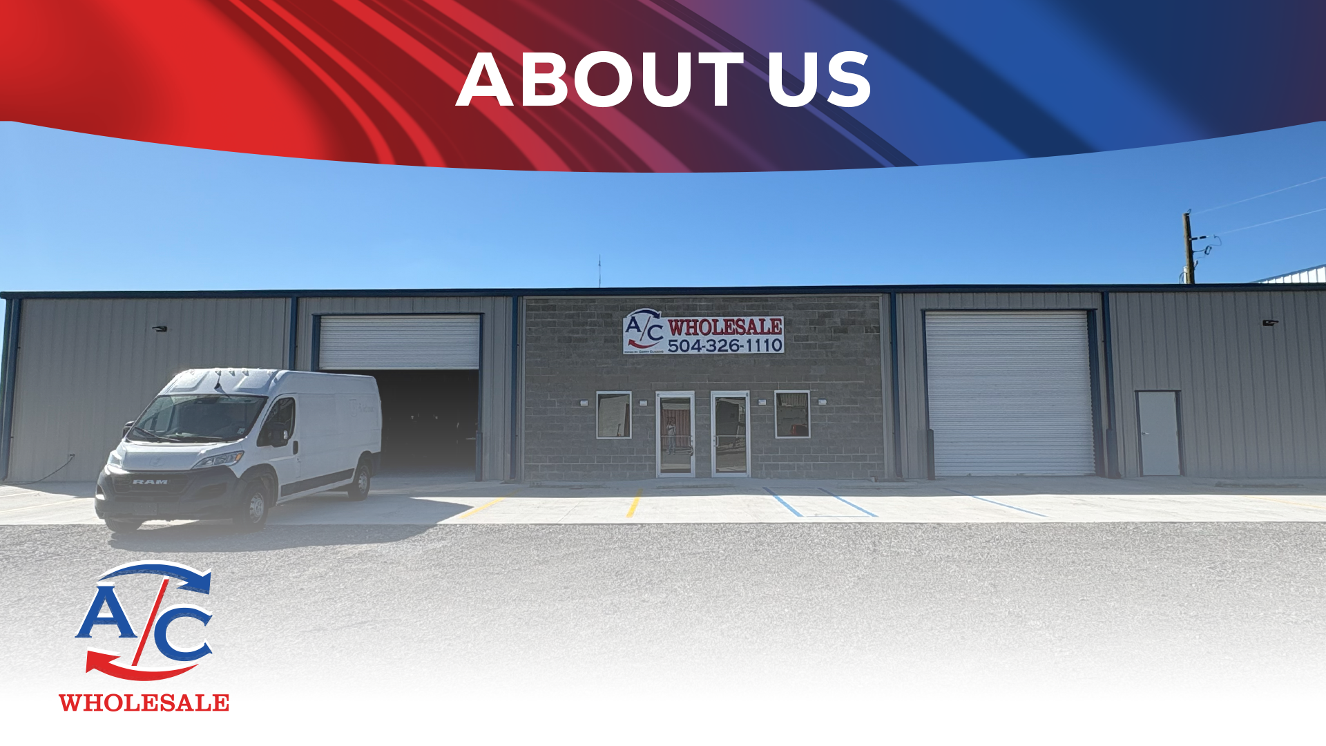 Exterior view of a warehouse building with an AC Wholesale sign and contact number, a white van parked in front, outside parking spaces, and a clear blue sky.