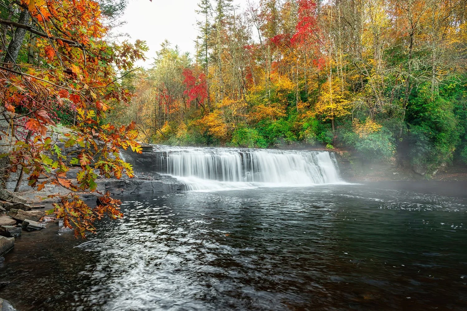 Stunning fall color at Hooker Falls in Brevard, North Carolina