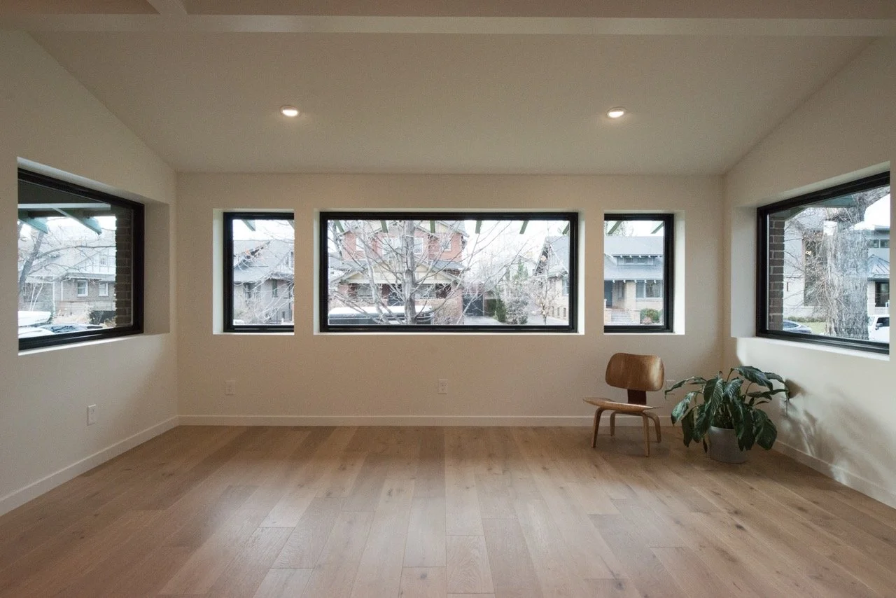 Open-concept interior reconfiguration of a 2,462 square foot Denver residence in Washington Park neighborhood