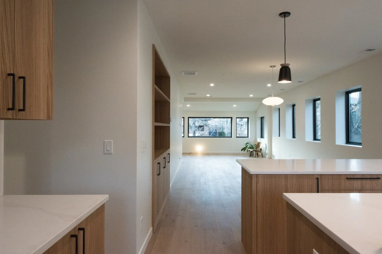 Open-concept interior reconfiguration of a 2,462 square foot Denver residence in Washington Park neighborhood