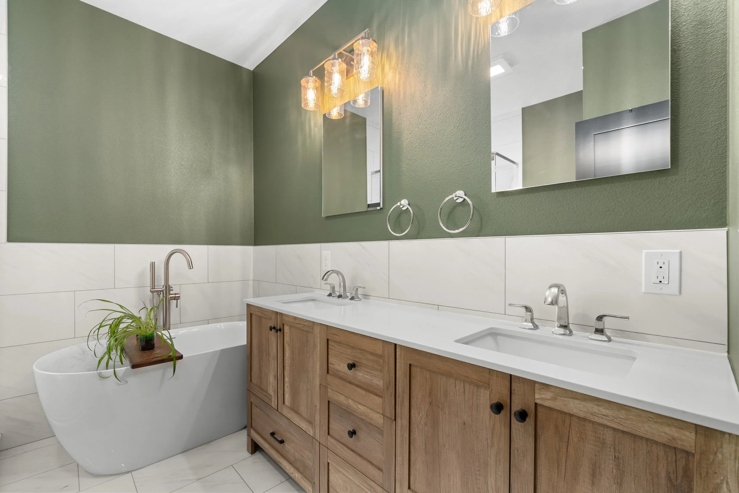 Custom master bathroom vanity and standalone bathtub in custom Colorado mountain house.