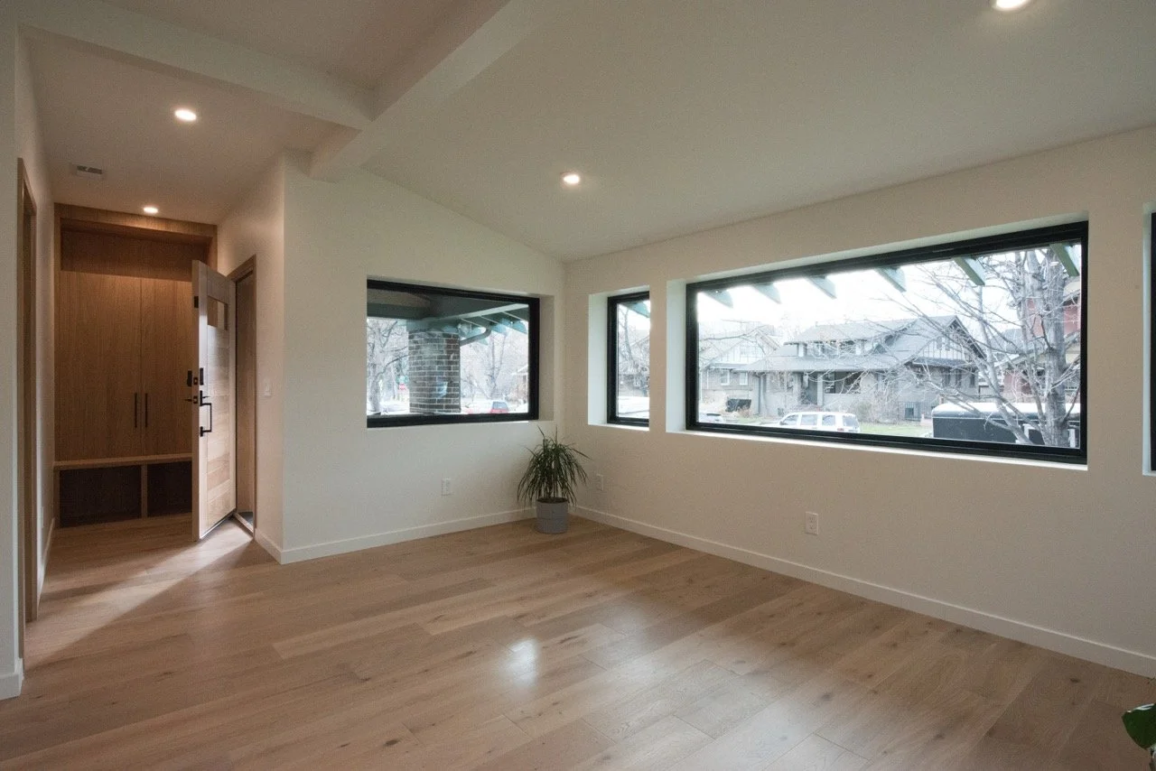 Open-concept interior reconfiguration of a 2,462 square foot Denver residence in Washington Park neighborhood
