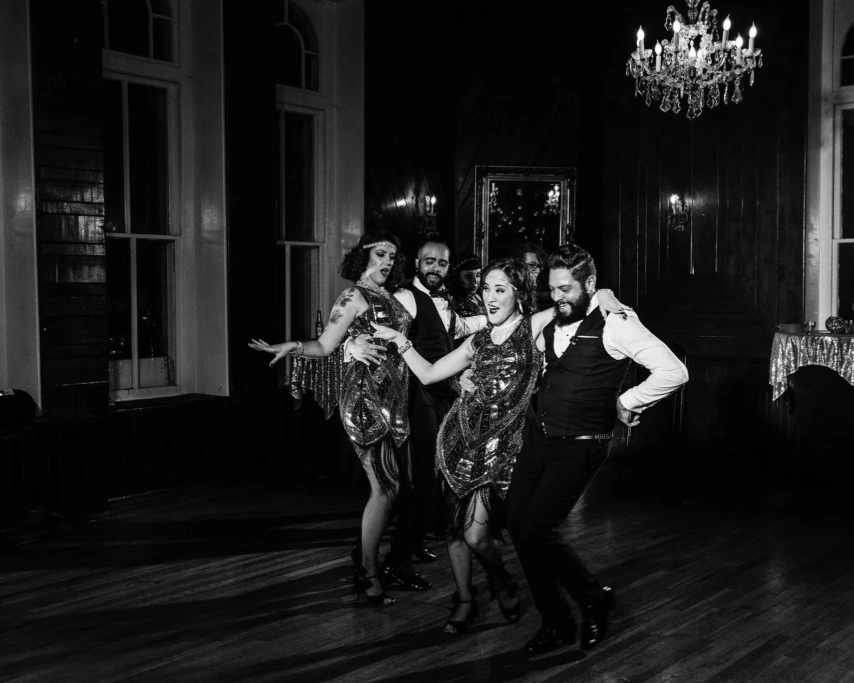 A group of swing dancers in 1920's costumes performing with Melonlight at the Crescent Hotel in Eureka Springs Arkansas, near Fayetteville, Bentonville, Rogers, and Springdale.