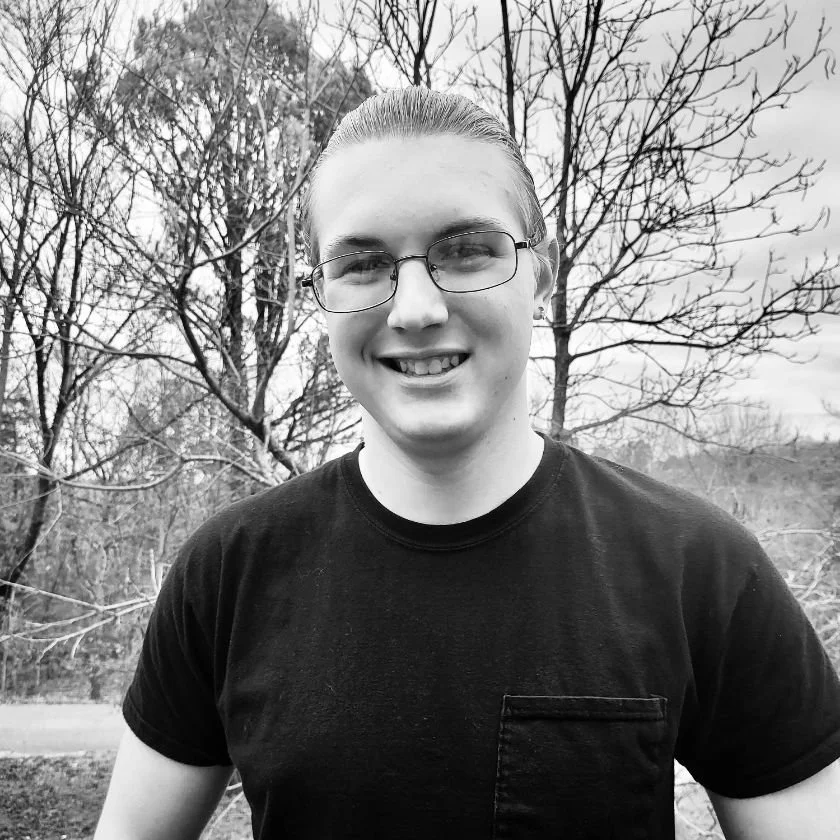 A headshot of Wyatt Patten, a light and sound tech for Christmas With the Rosses, an immersive theater show in Eureka Springs Arkansas, near Bentonville, Fayetteville, Rogers and Springdale.