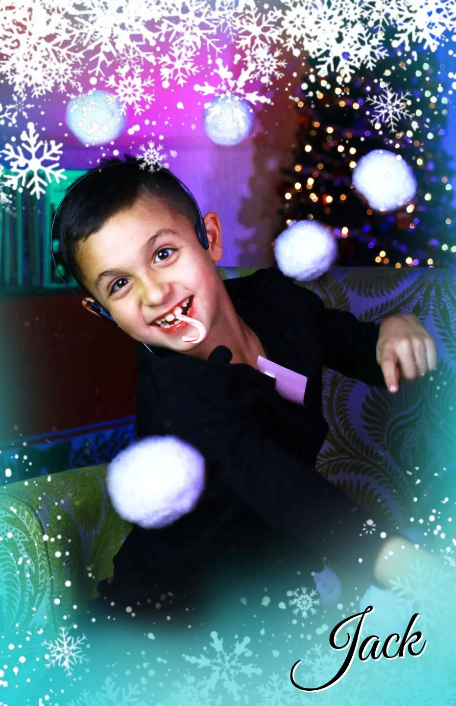 An actor smiling while eating a candy cane among flying snowballs in Christmas With the Rosses, an immersive theater show in Eureka Springs Arkansas near Fayetteville, Bentonville, Rogers, and Springdale.