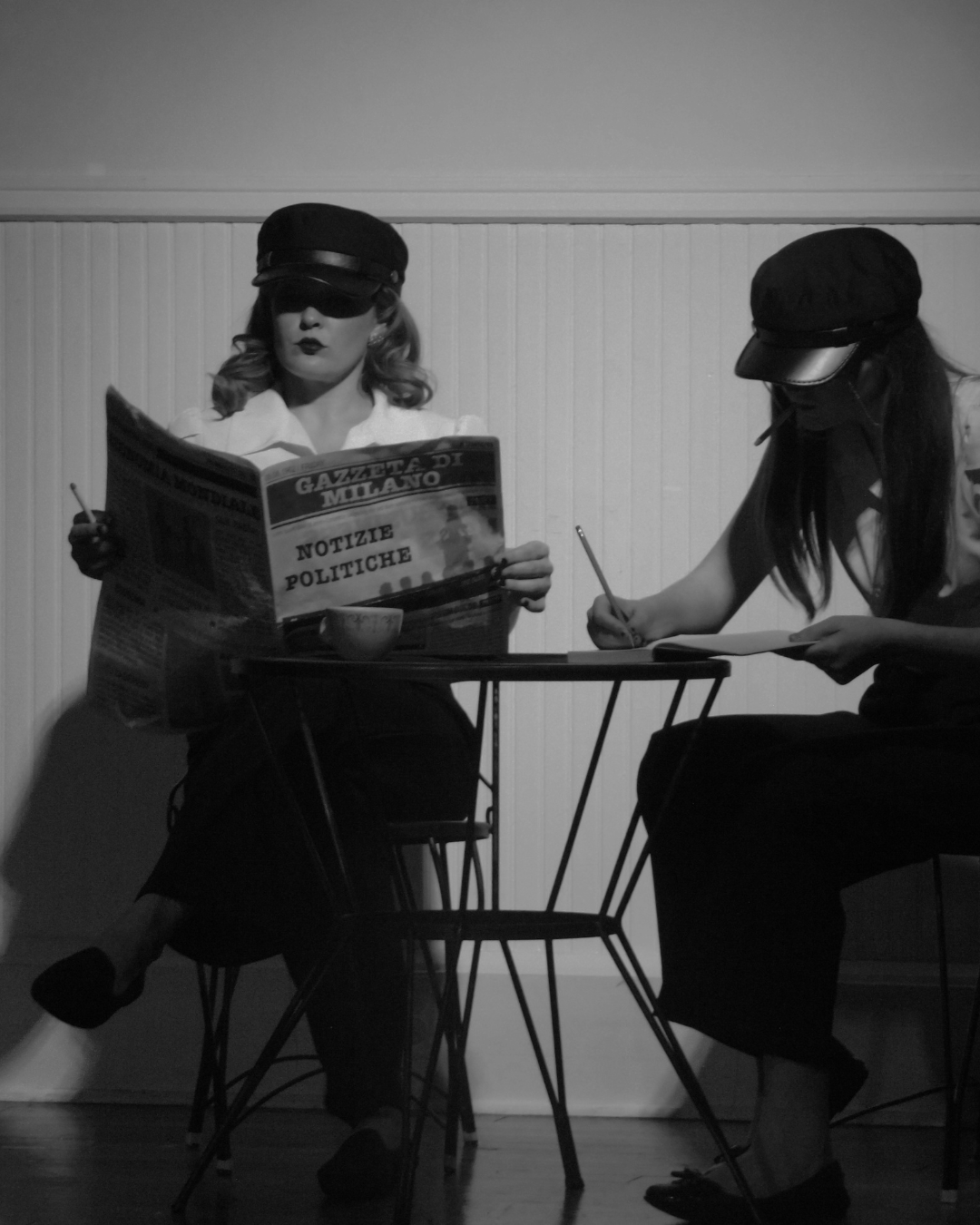 Two actors in law enforcement costumes in ROBBIE, an immersive theater show in Eureka Springs Arkansas, near Bentonville, Rogers, Fayetteville, and Springdale.
