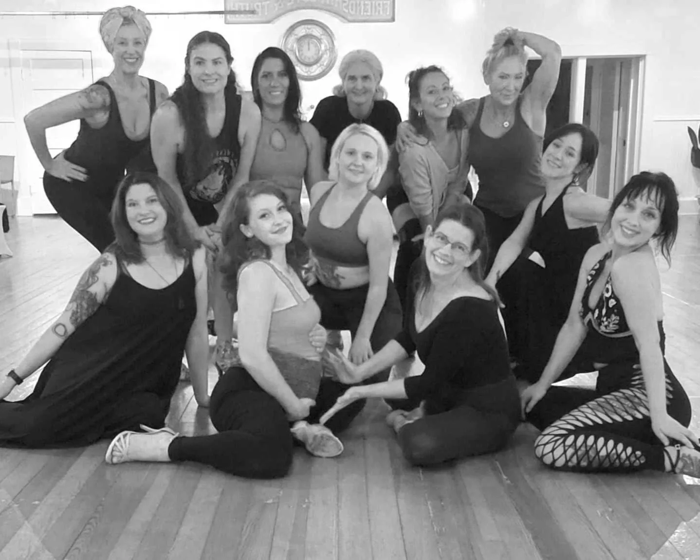 Burlesque dancers posing together after class at Melonlight in Eureka Springs, Northwest Arkansas.