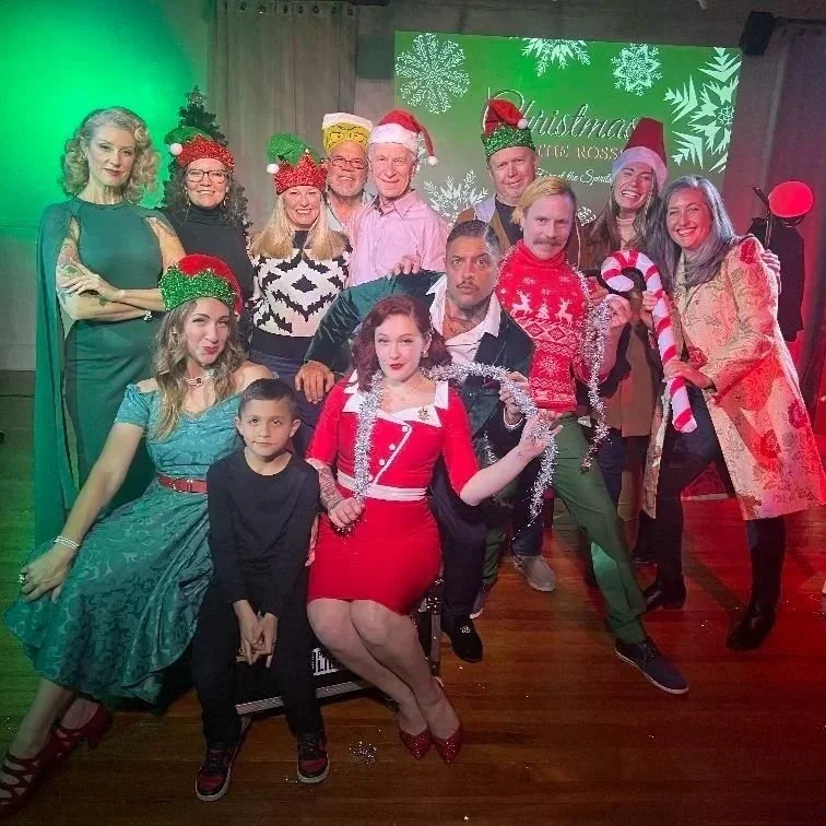 The cast of Christmas With the Rosses posing with audience members in Eureka Springs, Northwest Arkansas, near Bentonville, Fayetteville, Rogers, and Springdale.