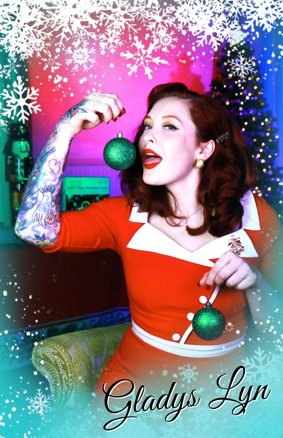 Actor posing playfully with Christmas ornaments in a vintage style red dress in Christmas With the Rosses, an immersive theater show in Eureka Springs Arkansas, near Bentonville, Rogers, Springdale, and Fayetteville.