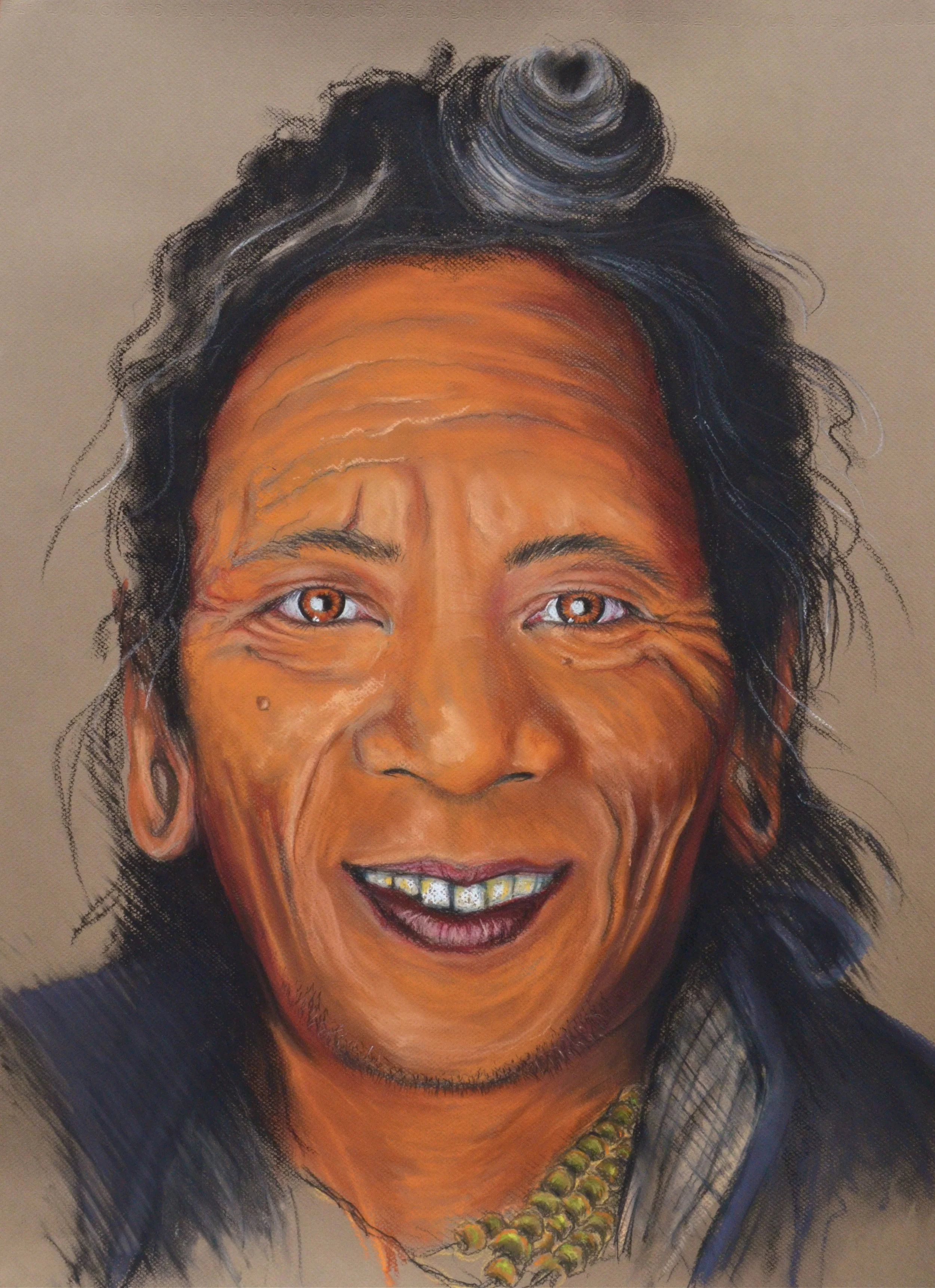 Portrait of an elderly woman with gray hair, a warm smile, and wearing a necklace and earrings.