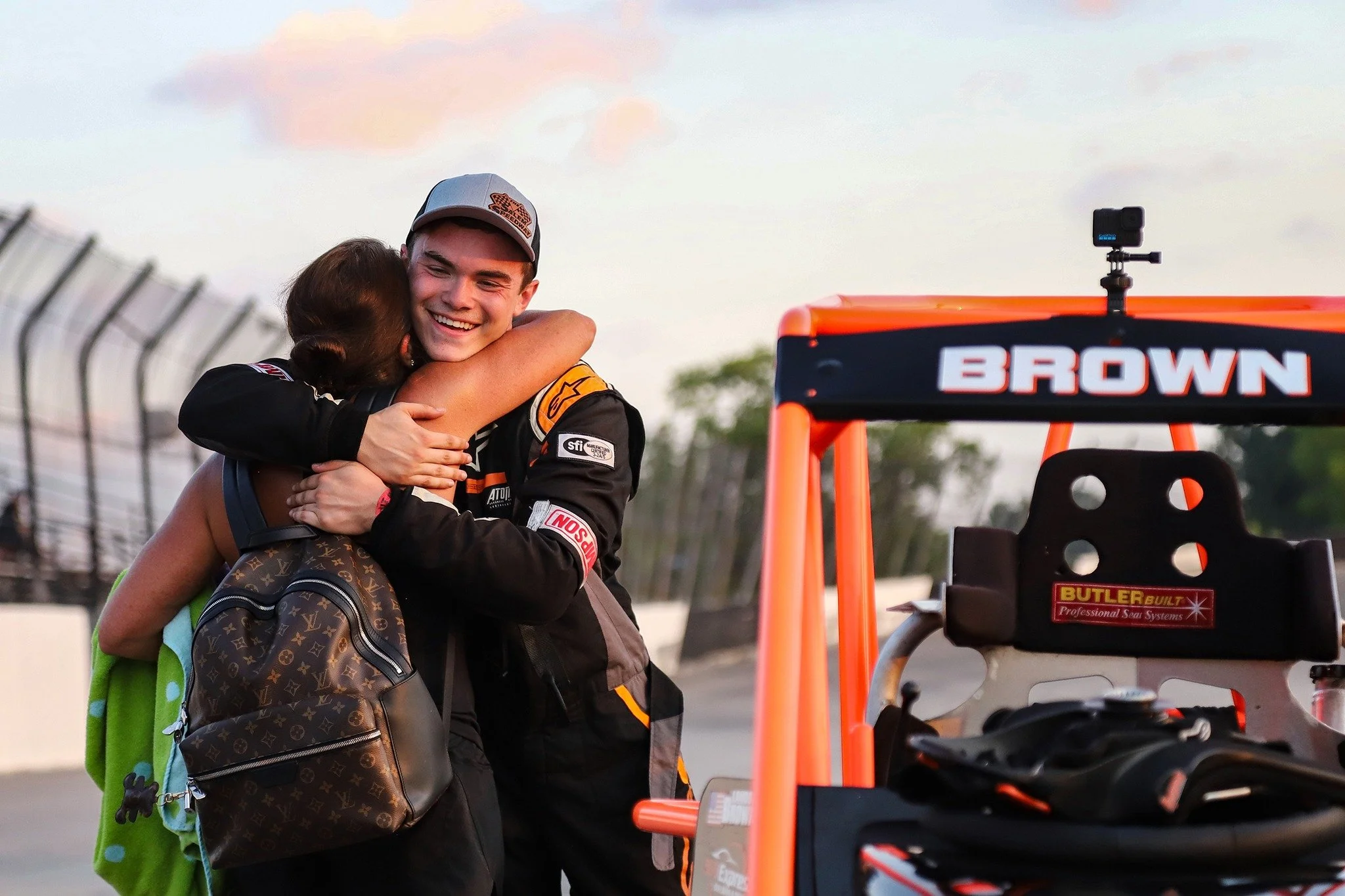 landon brown hugging his mother sonya lentini after a kenyon midget win at salem speedway