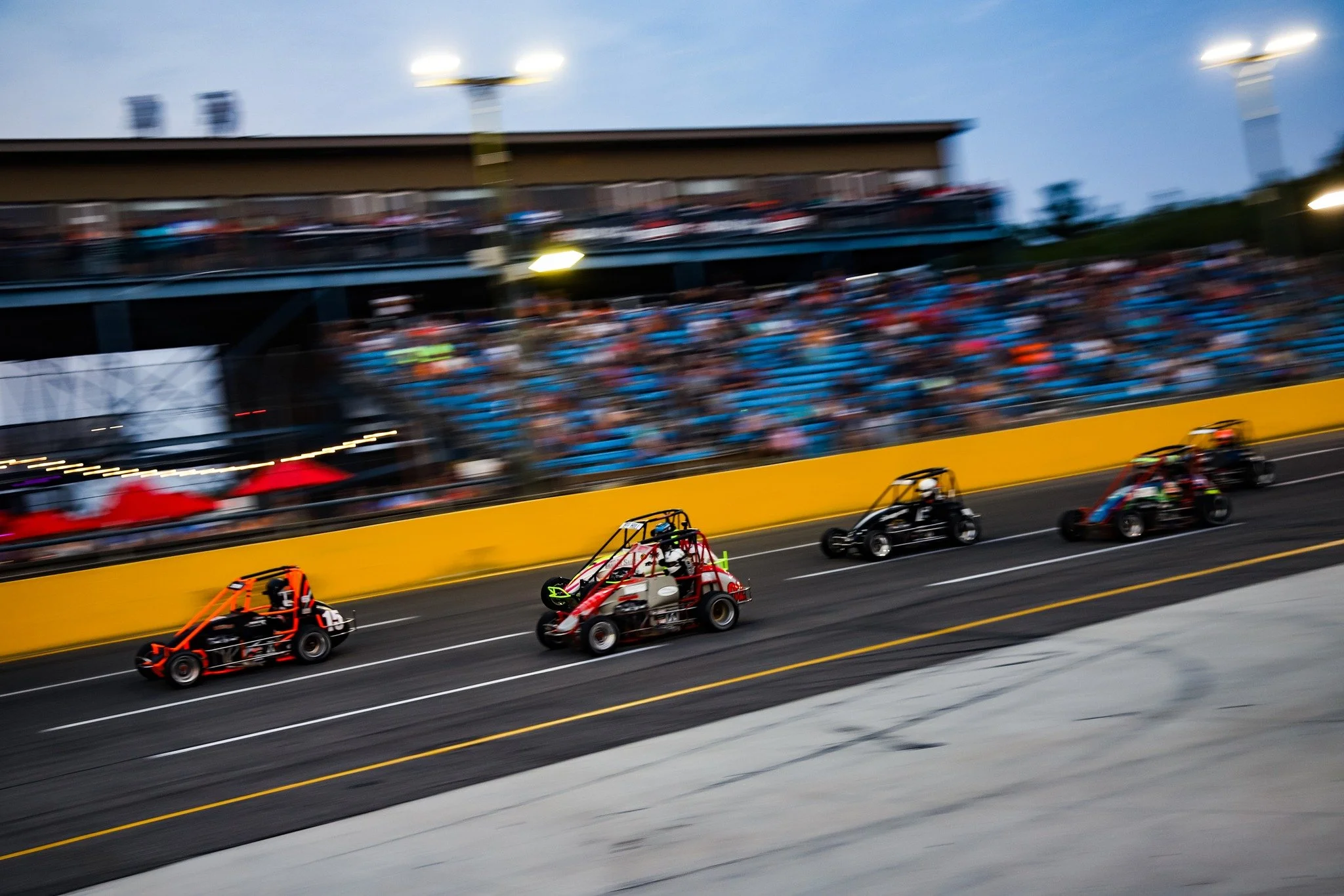 Landon Brown leading the pack in the Kenyon Midget Series at Berlin Speedway in Michigan.