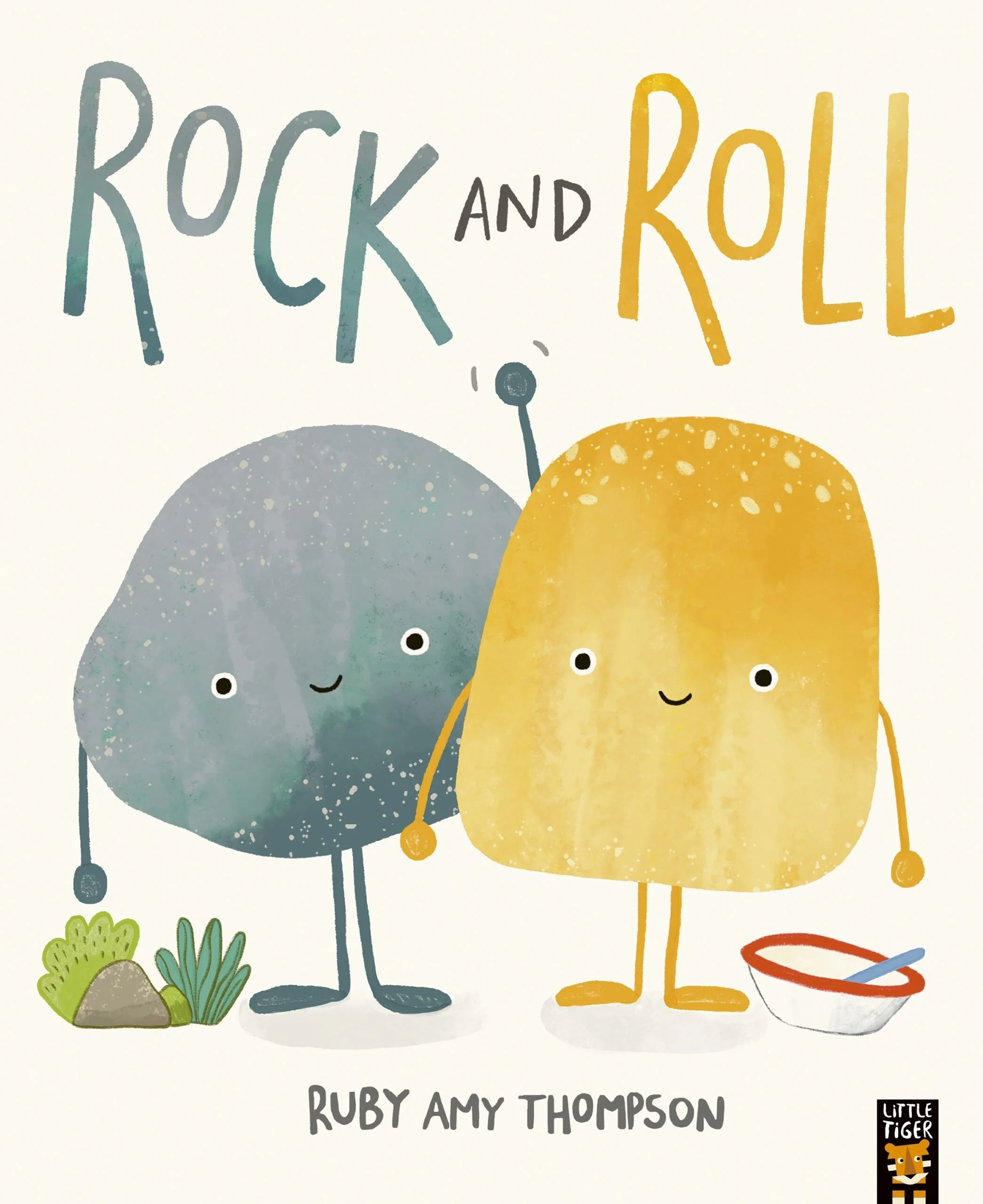 Cover illustration of a children's book titled 'Rock and Roll' by Ruby Amy Thompson, featuring a smiling gray rock and a yellow bell peppers holding hands, standing on grass with a bowl and spoon nearby.