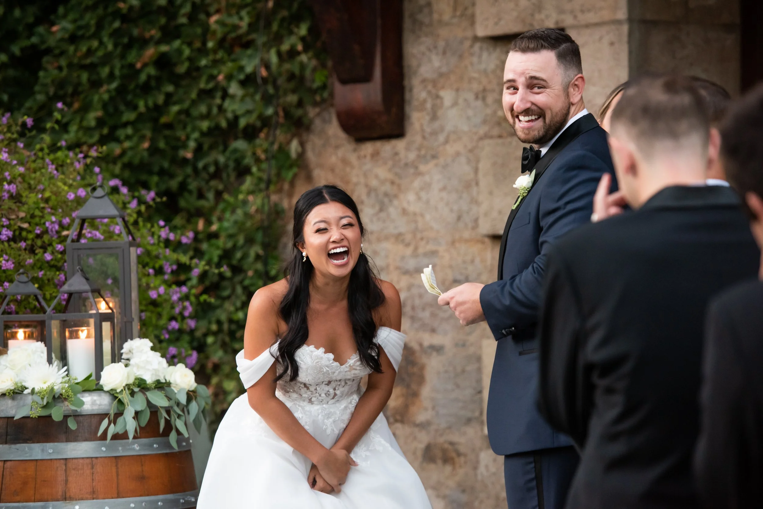 Bride laughing during vows