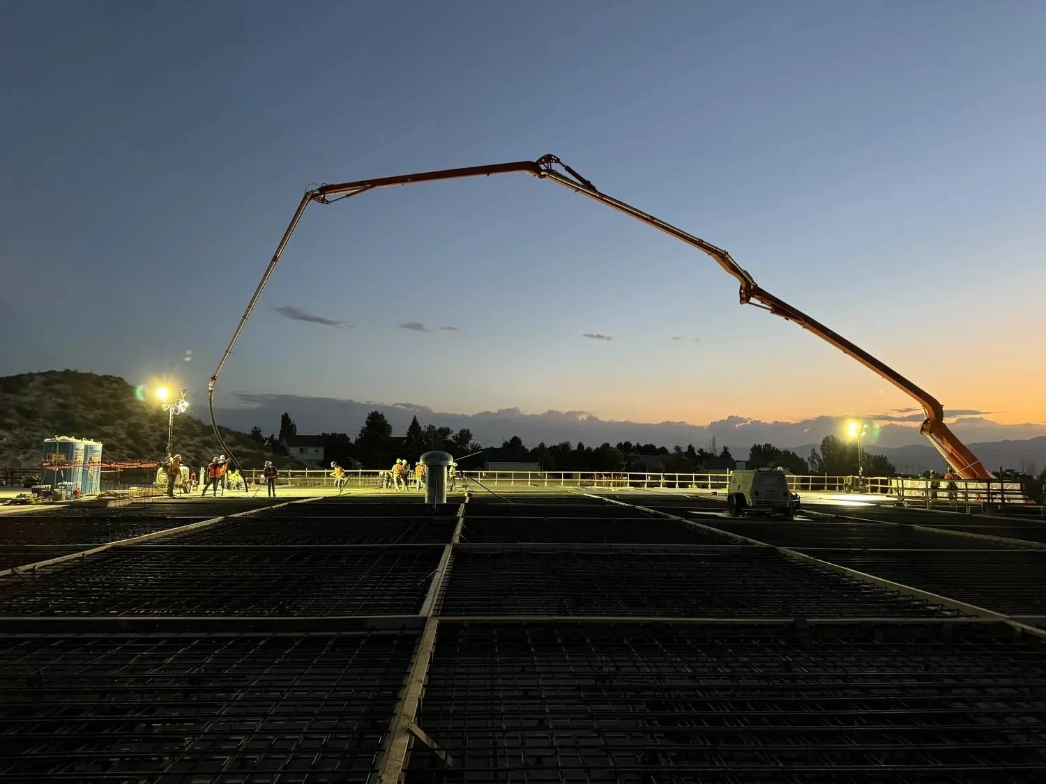 Active foundation and structural construction site in Los Angeles managed by AY Builders with strict quality control.