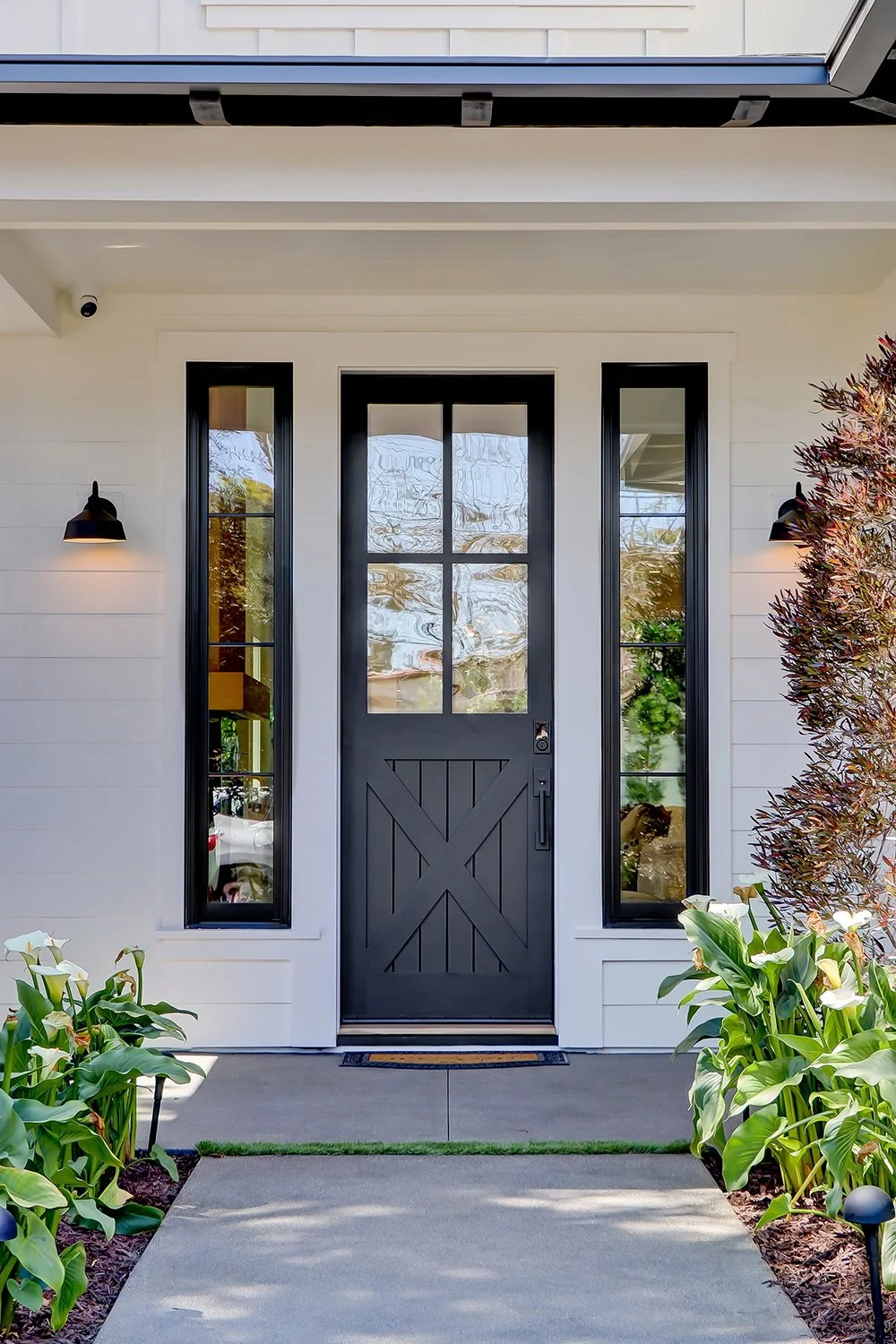 elegant custom residential home construction in Hidden Hills by AY Builders featuring modern architecture and high-end exterior finishes front entrance