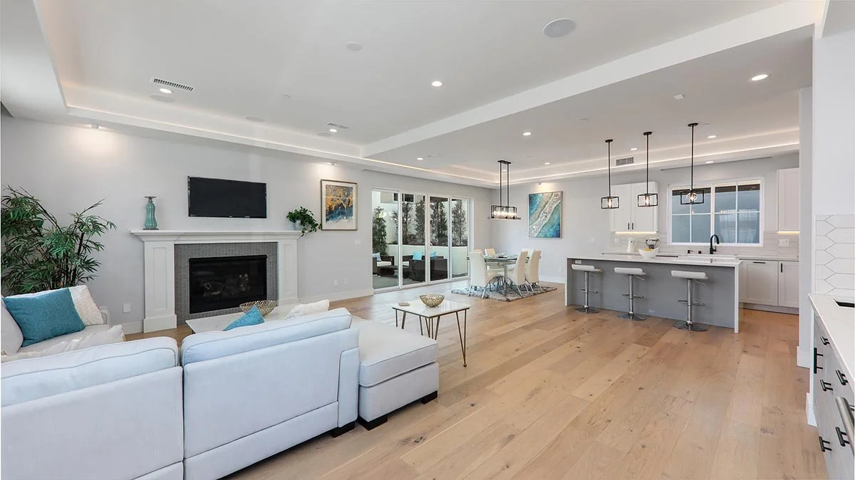 High-end open concept living room in Calabasas custom home by AY Builders with luxury finishes and modern design