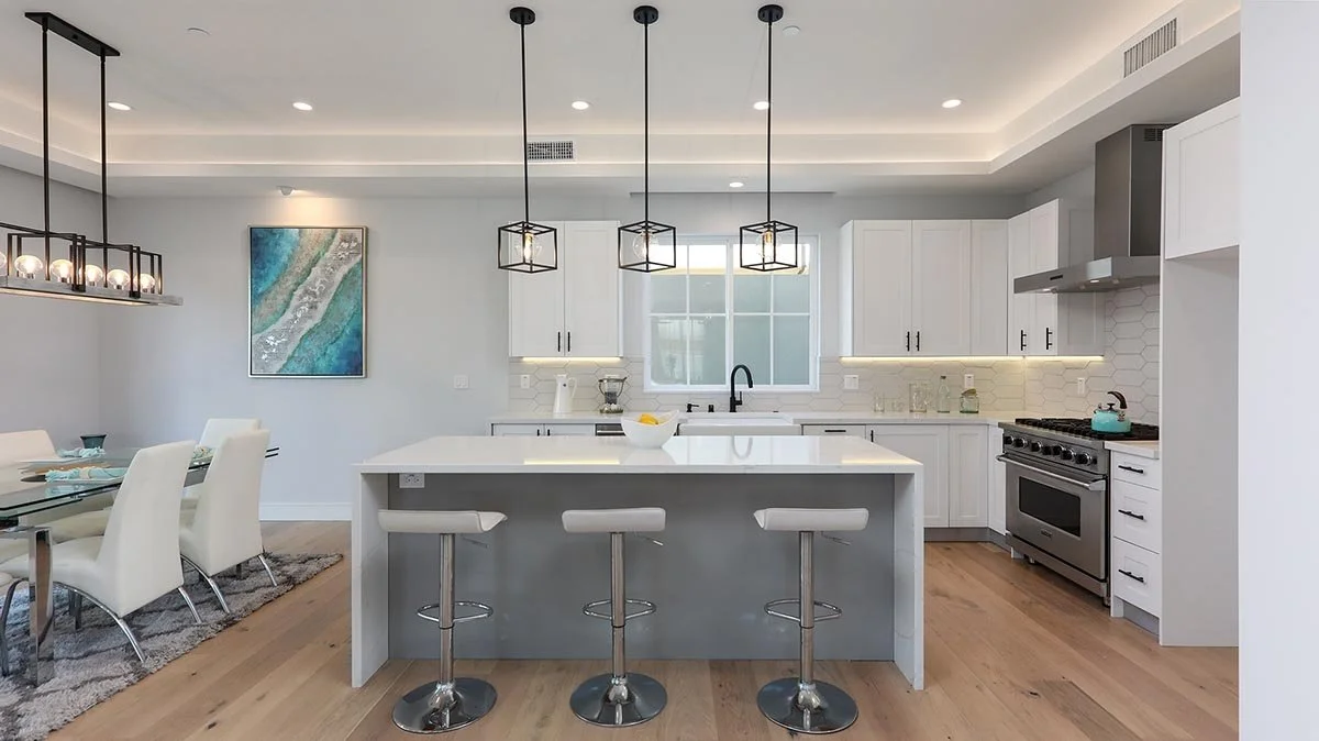 High-end open kitchen concept in Calabasas custom home by AY Builders with luxury finishes and modern design