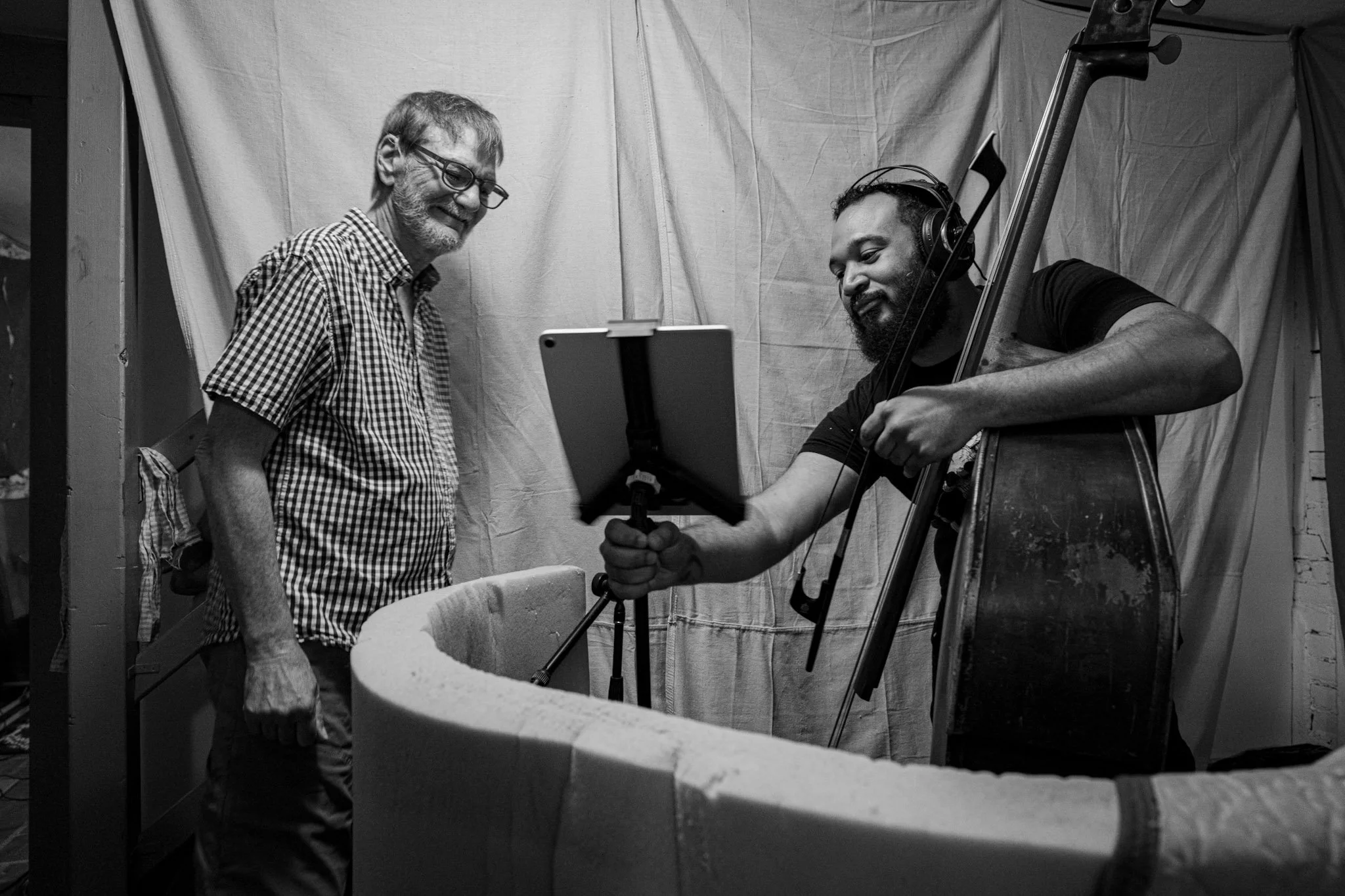 John Rapson and bassist Blake Shaw looking at sheet music during the Esteban recording session.