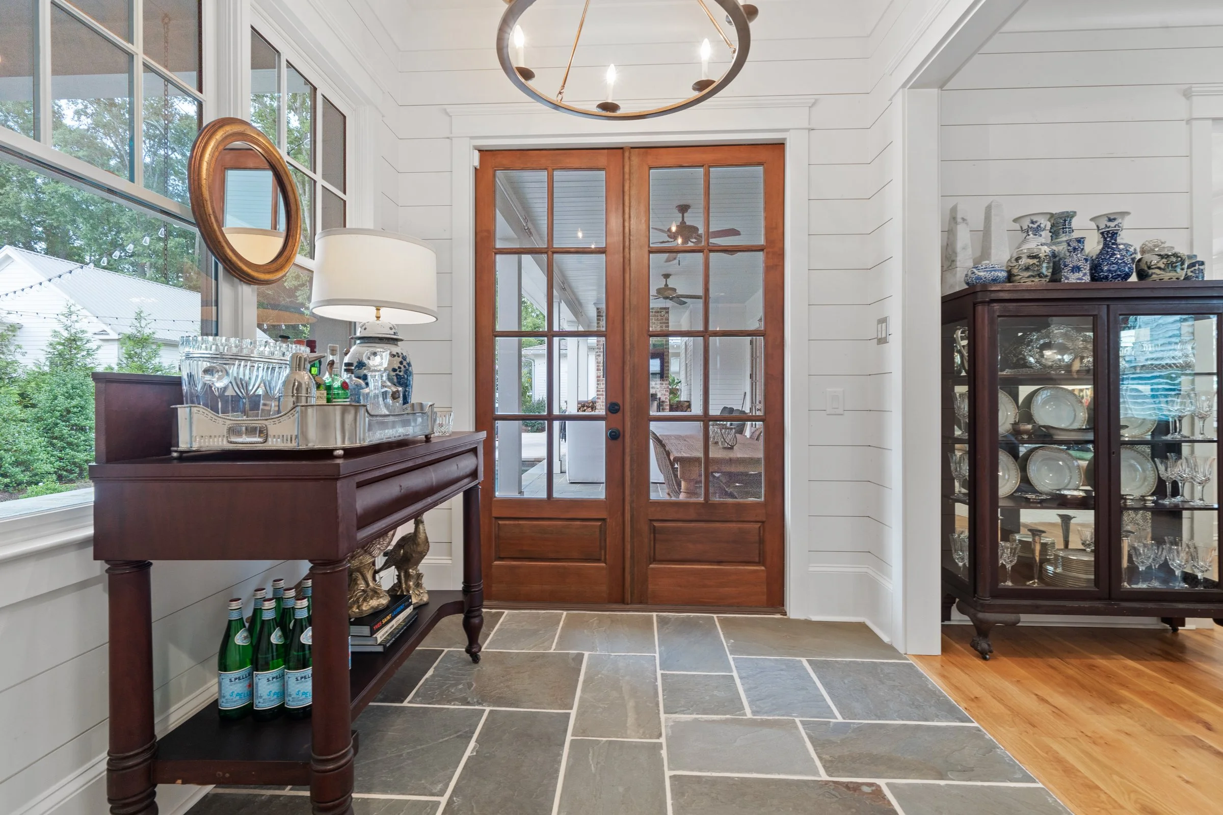 Double doors with stone flooring