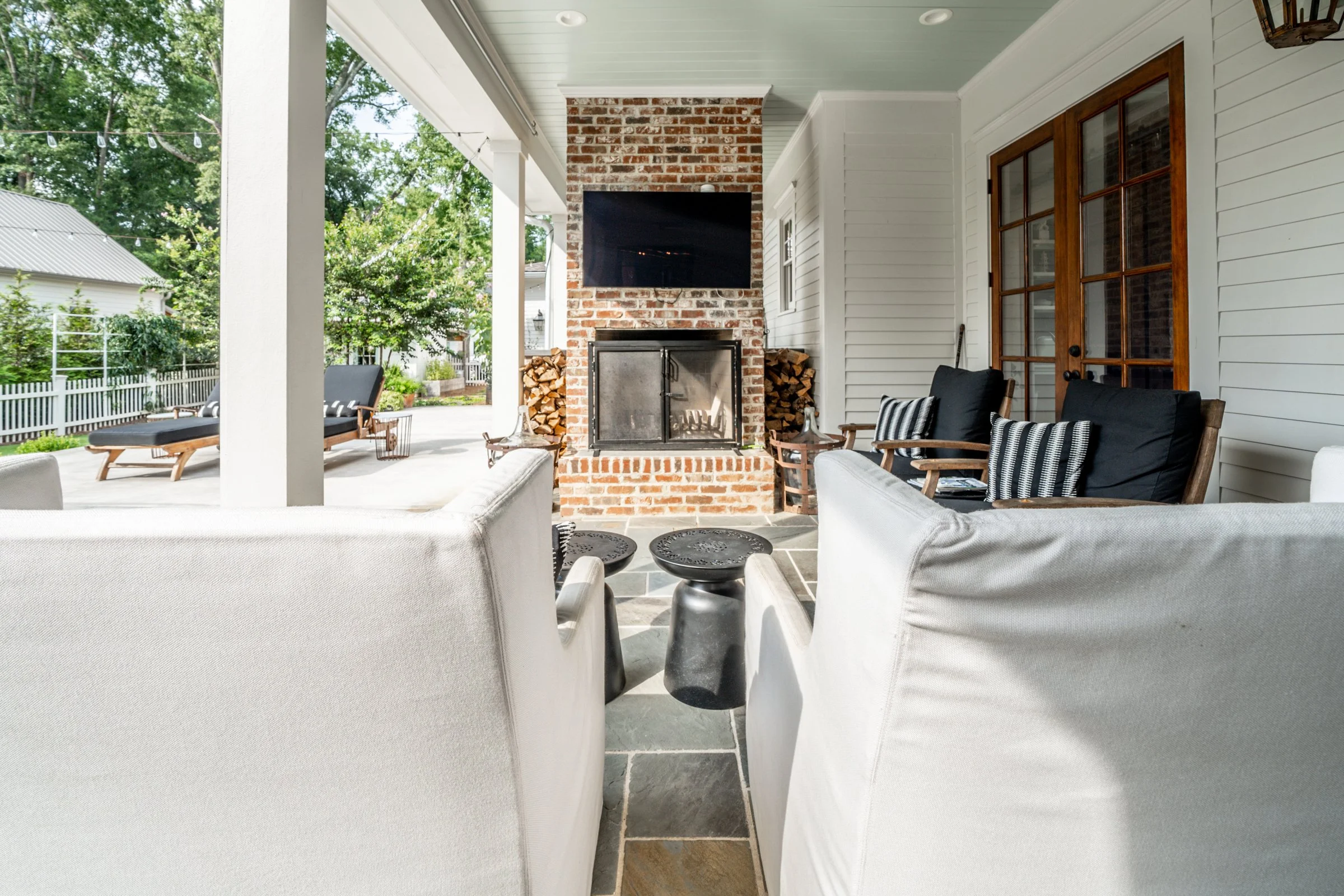Outdoor brick fireplace with seating 