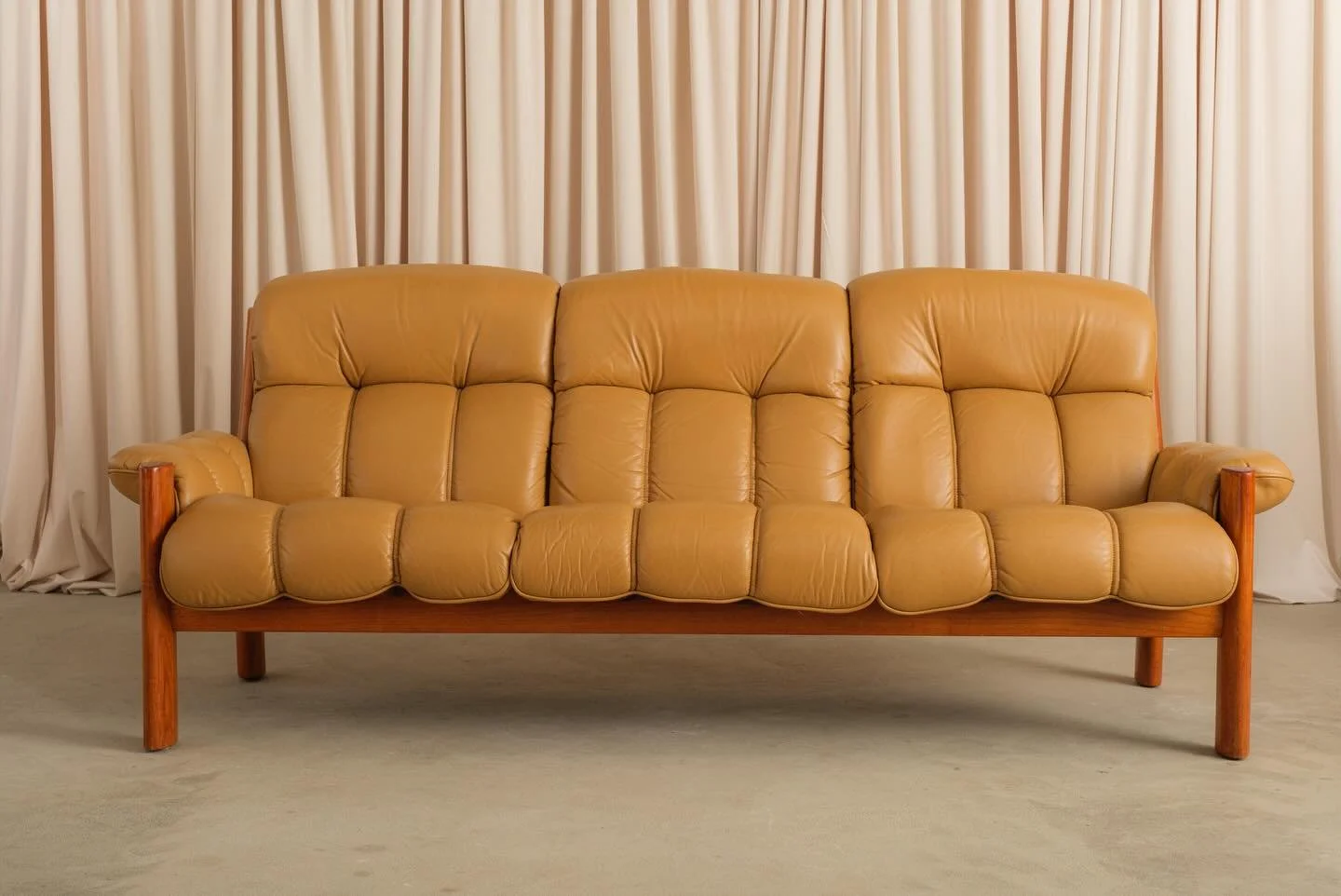 Montana Sofa 3-Seater by Ekornes, 1970s.
Design Institute of America side table available as well.

Norway looked at the sofa and decided it wasn&rsquo;t doing enough. The result was the Montana: a solid teak frame, clean Scandinavian lines, and cush