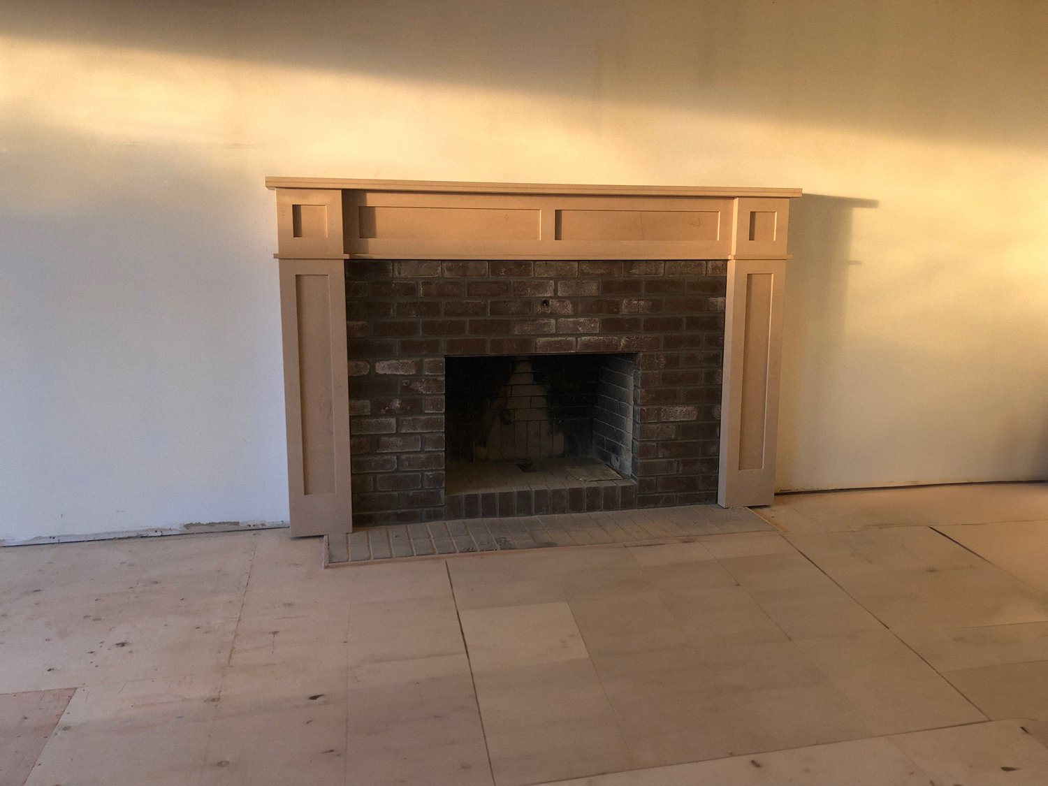 Modern fireplace surround with built-in shelving