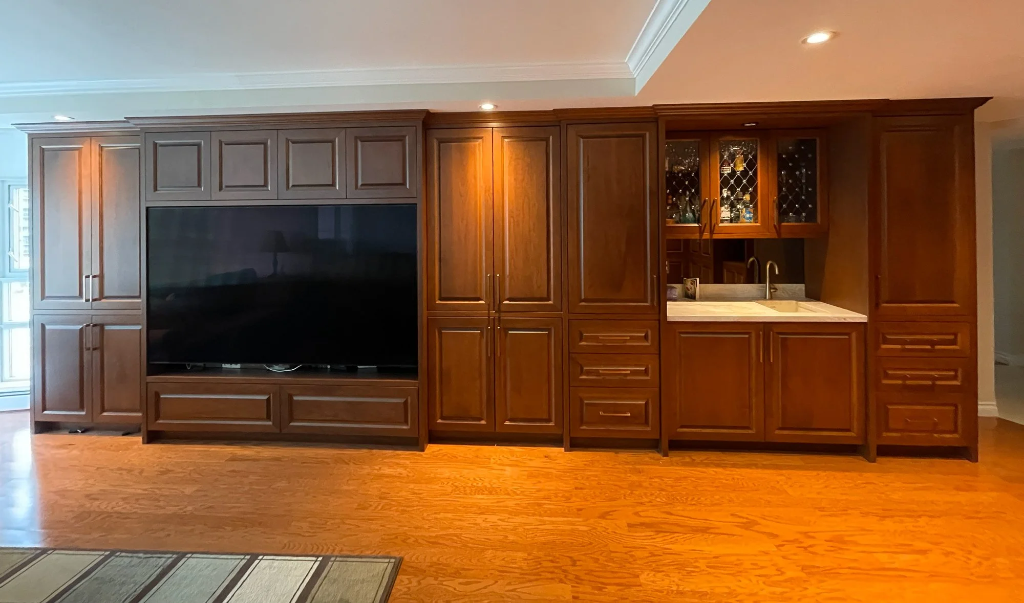 Built-in wood cabinetry by Alpha Woodcrafts