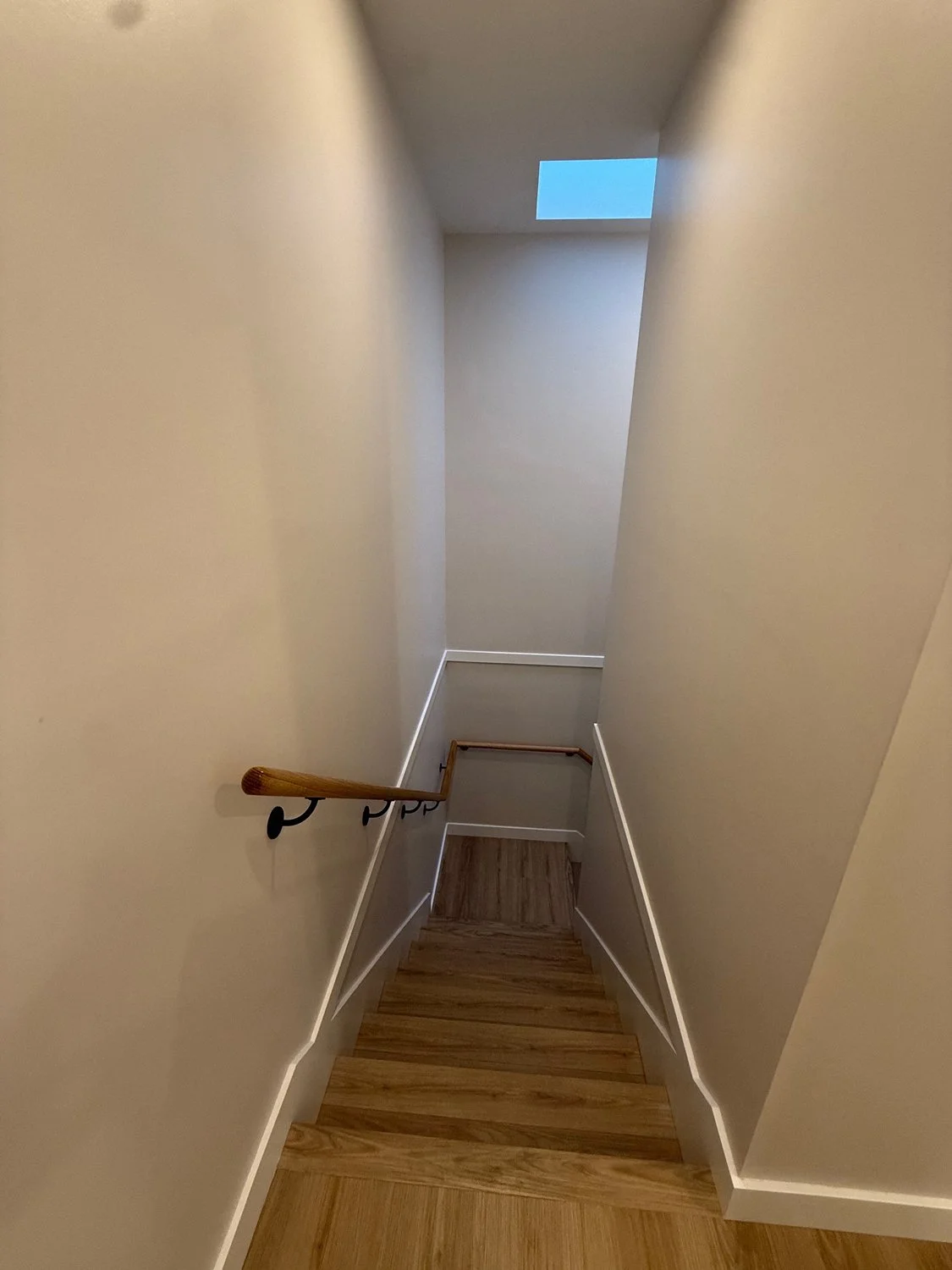 Custom residential staircase with wood treads