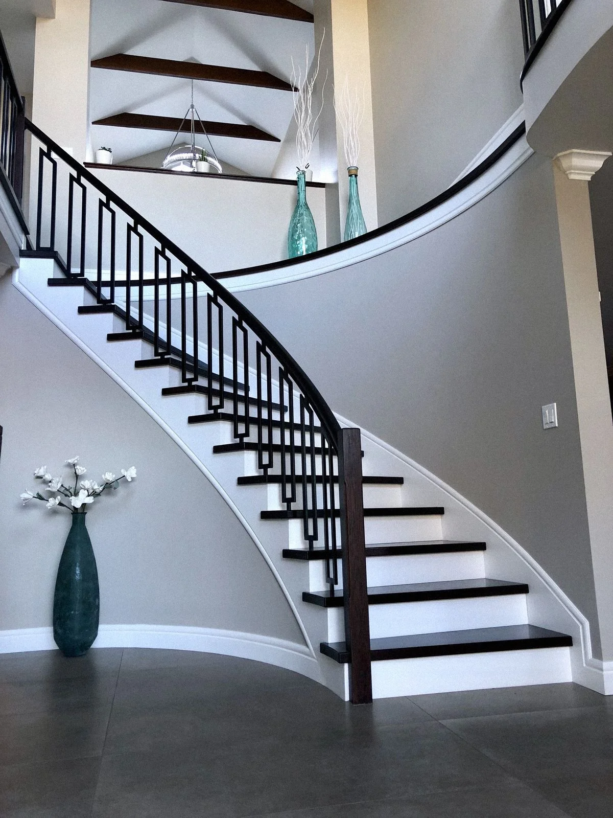 Solid wood curved stair with black railing – Burnaby  vancouver - luxury stairs Burnaby