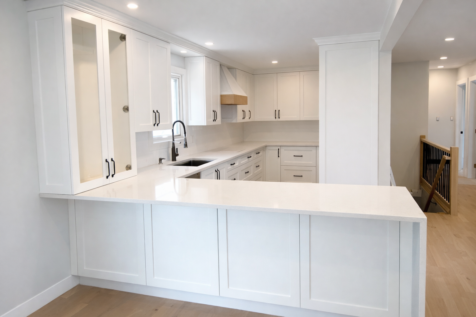 Custom high-end kitchen cabinetry with large stone island by Alpha Woodcrafts BC in Vancouver