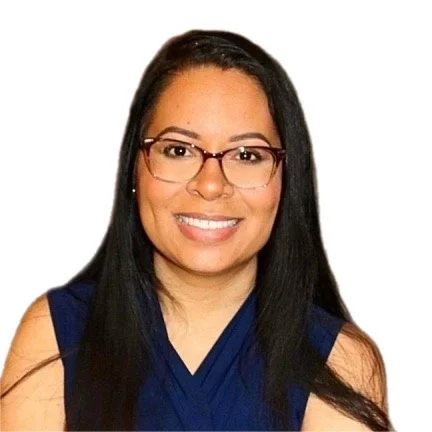 A woman with long black hair, wearing glasses and a blue sleeveless top, smiling at the camera.
