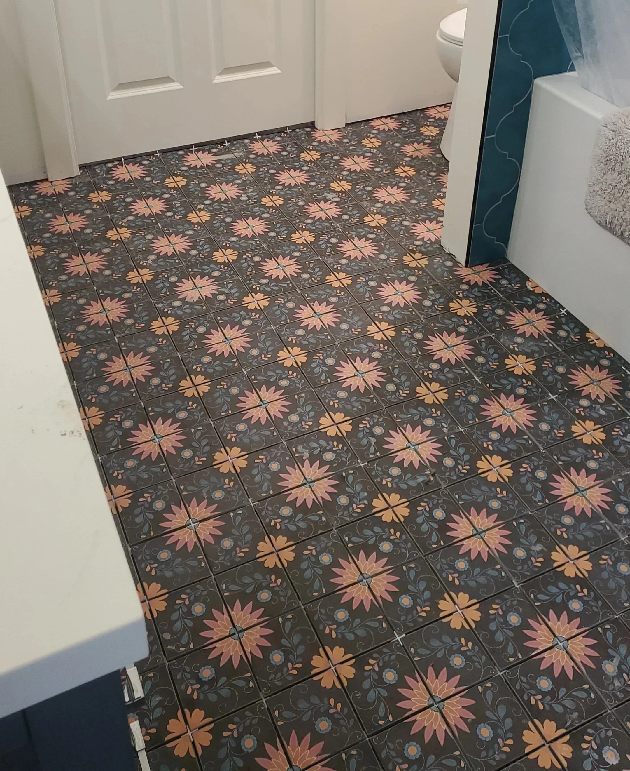 washroom tile floor contractor in Kelowna residential home. Tetris Tiling