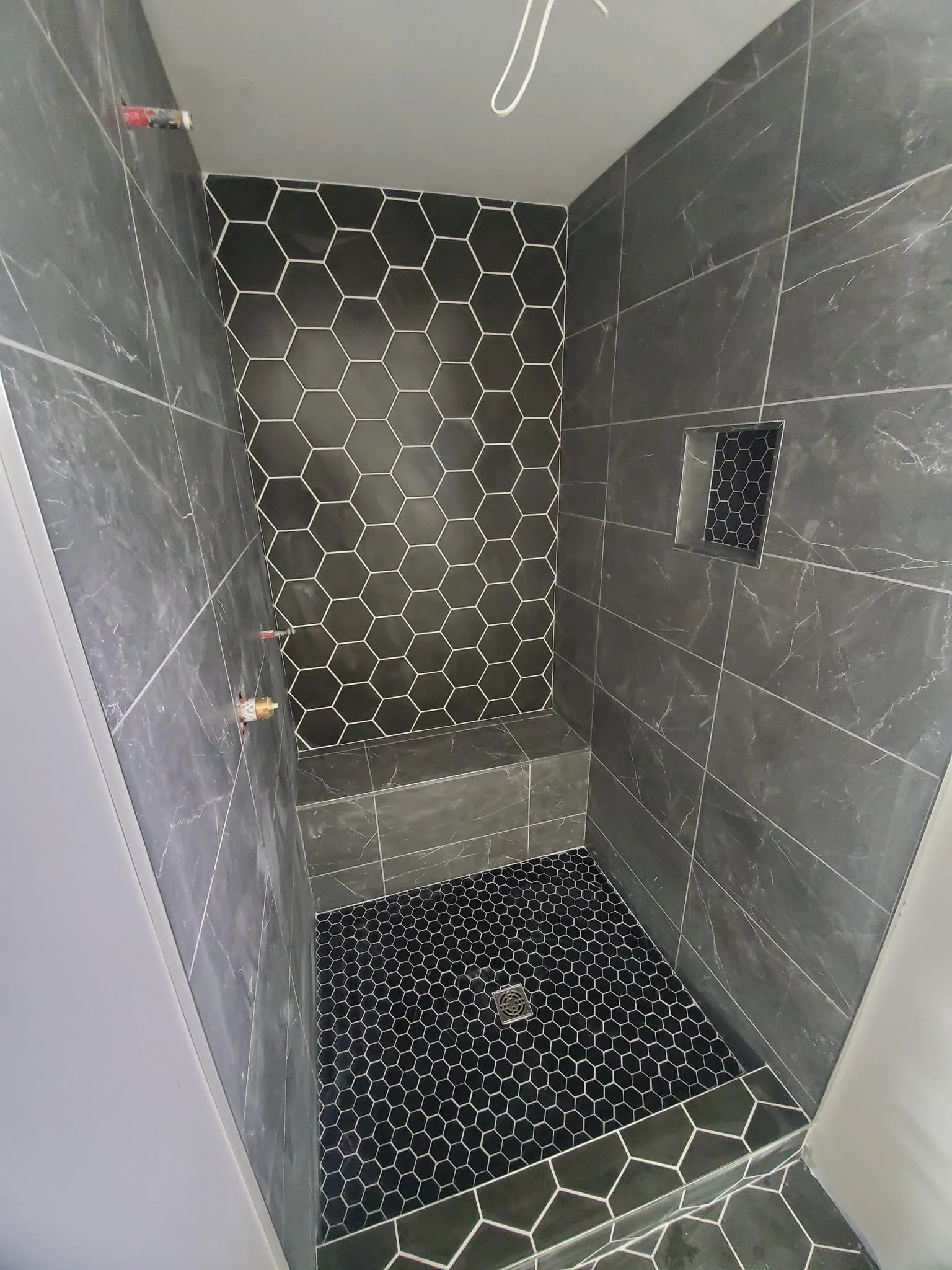 Custom tiled walk-in shower completed in the Okanagan