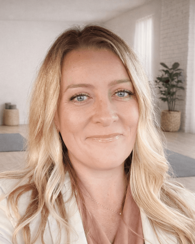 Lora Brady holistic health practitioner in yoga studio