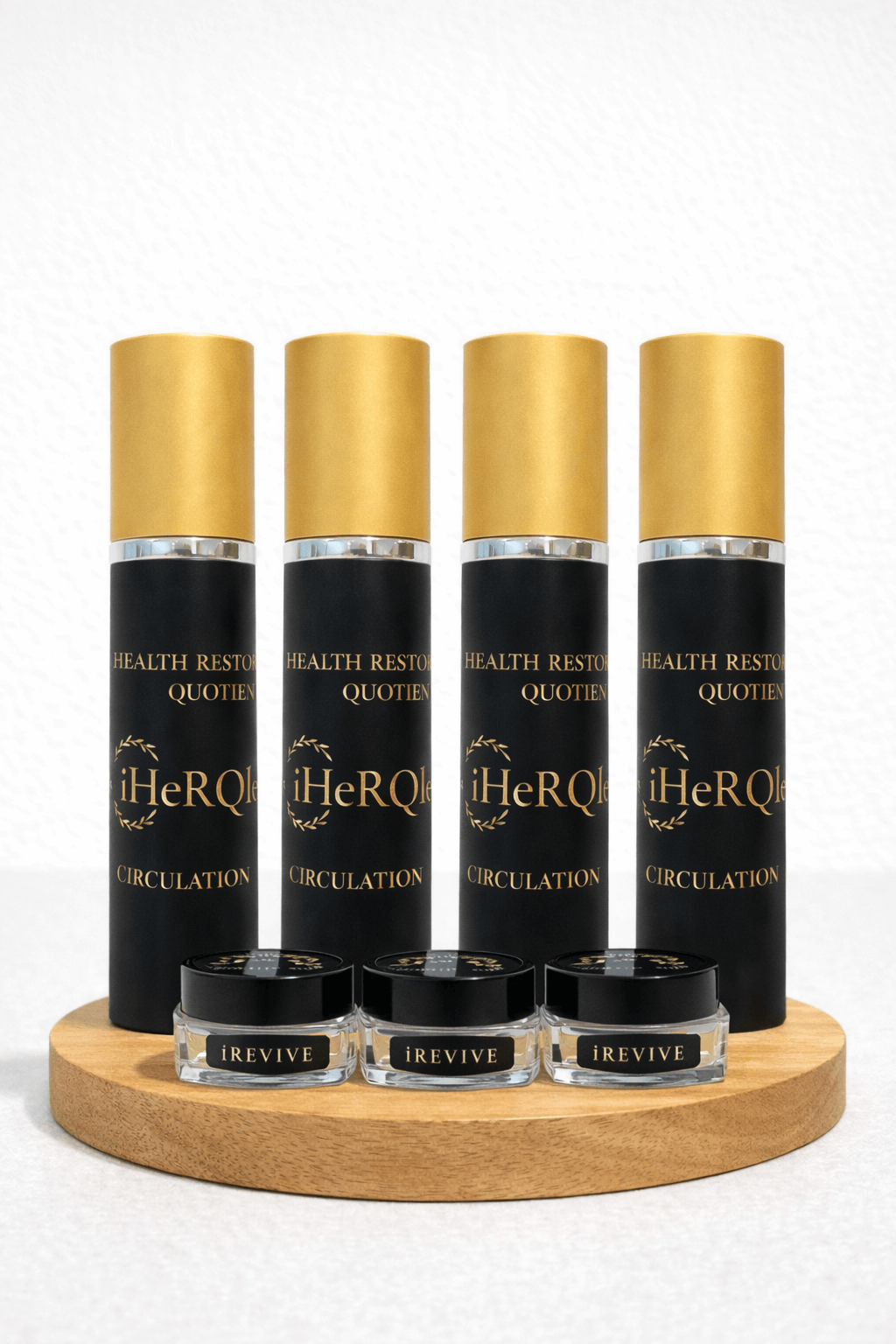 Four bottles of iHeRQles molecular nutrition sprays with 3 samples of iRevive cream
