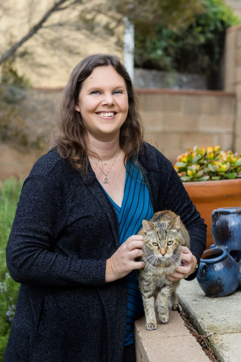 Jennifer Van Valkenburg holding her cat Jalapeno.