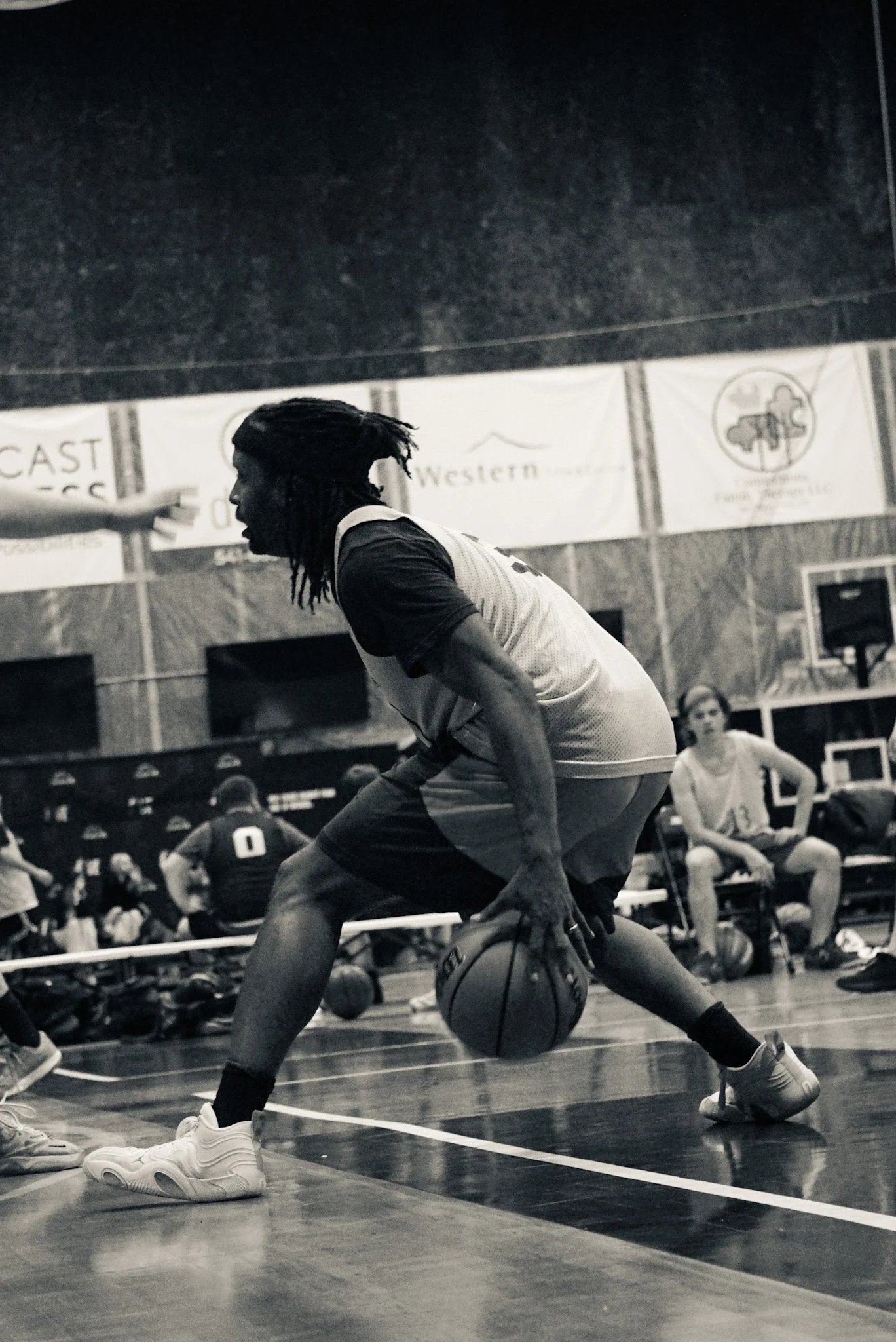 Man playing basketball dribbling