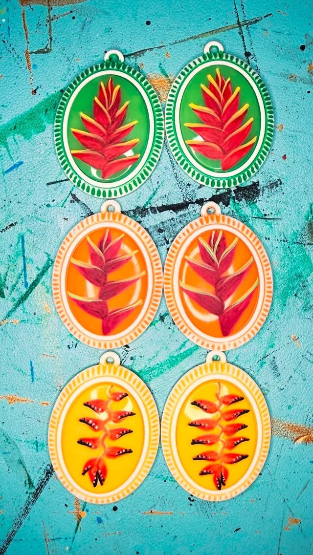 Six decorative pendant frames with Tropical leaf designs, arranged vertically on a colorful, textured background.