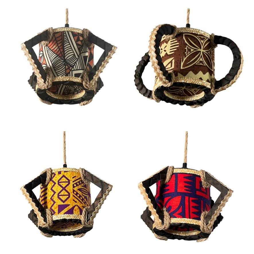 Four decorative hanging lanterns with tribal patterns, each with a rope for hanging. The lanterns have intricate geometric and abstract designs in various colors.