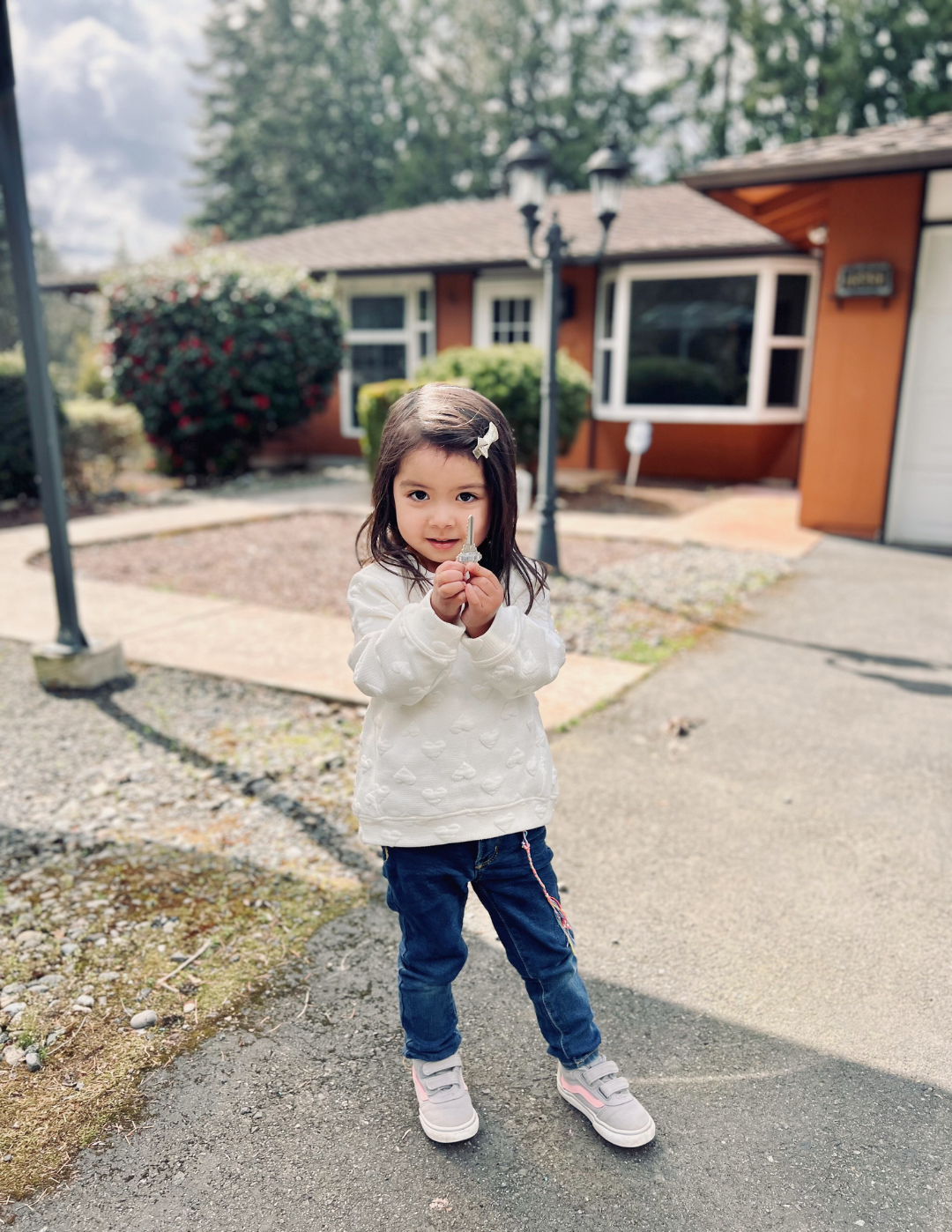 A cute picture of Maya Ranny and Brian's daughter.png