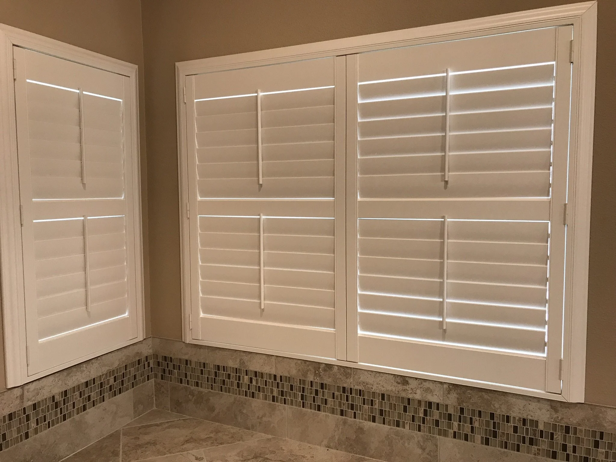 Hunter Douglas Palm Beach Polysatin Vinyl Shutters, 3 1/2" louvers, White Silk, divider rails, front tilt rods, Colonial Z frame, 1 panel and 2 panels, faux shutters.