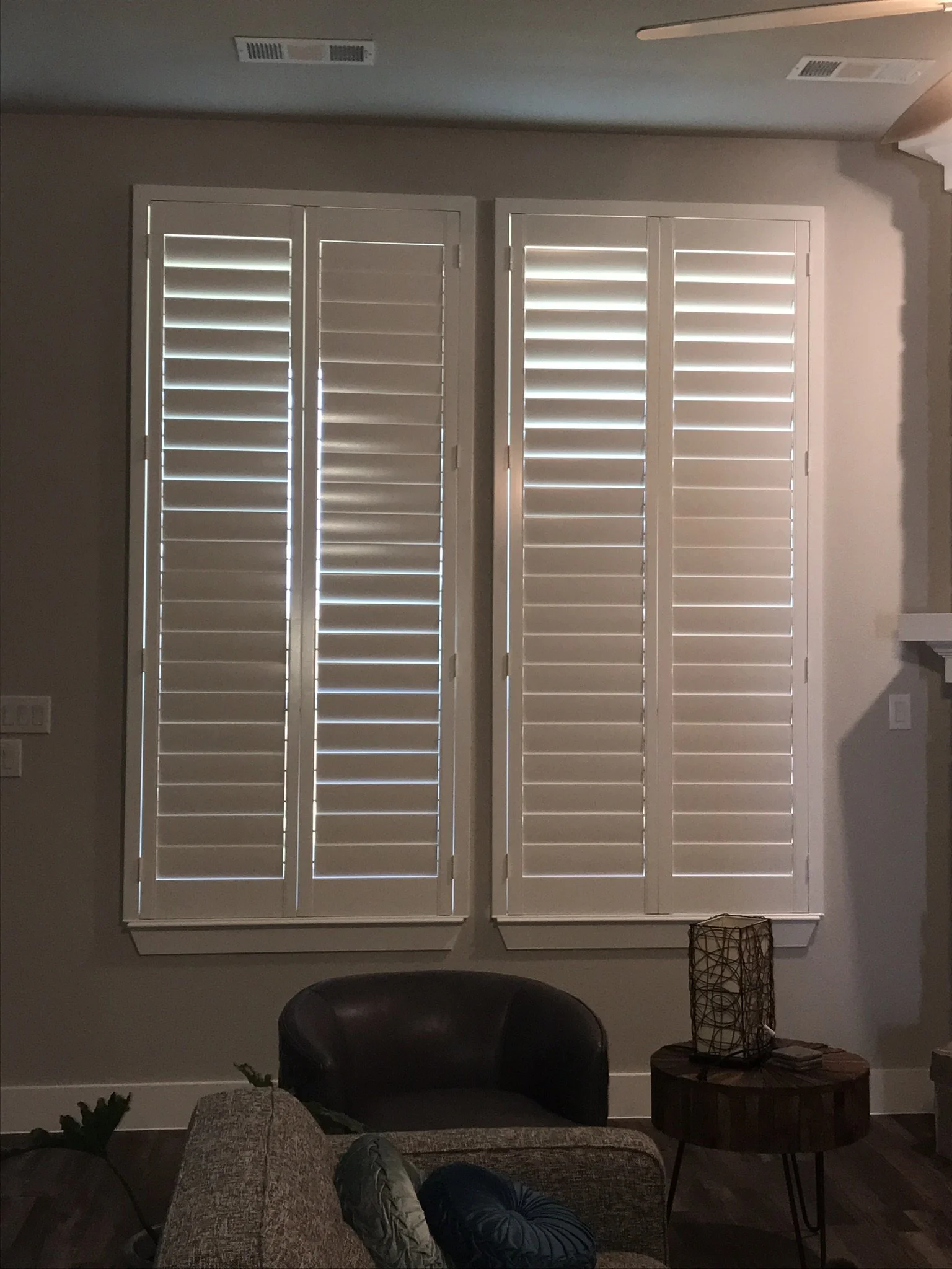 Wood shutters with rear hidden tilt, 4 1/2" louvers, SW Pure White, no divider rails.  2 panels.