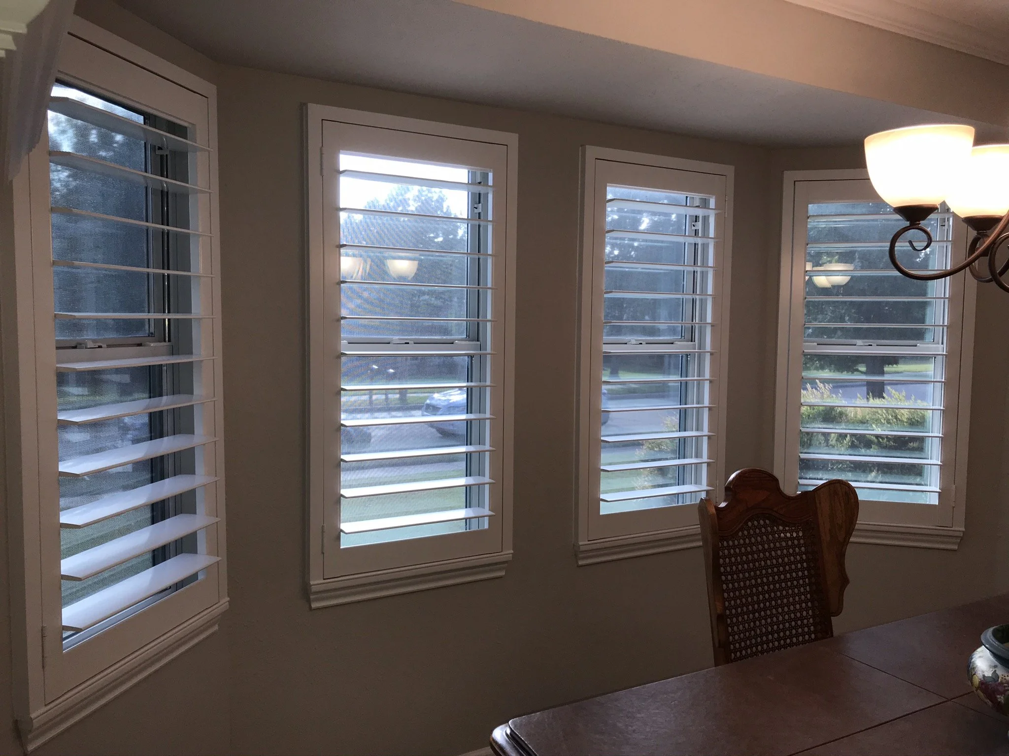 Custom wood plantation shutters with clearview (rear hidden tilt), 4 1/2" louvers, painted SW Pure White semi-gloss, 1.5" flat master frame and Z frame, no splits.  1 panel.